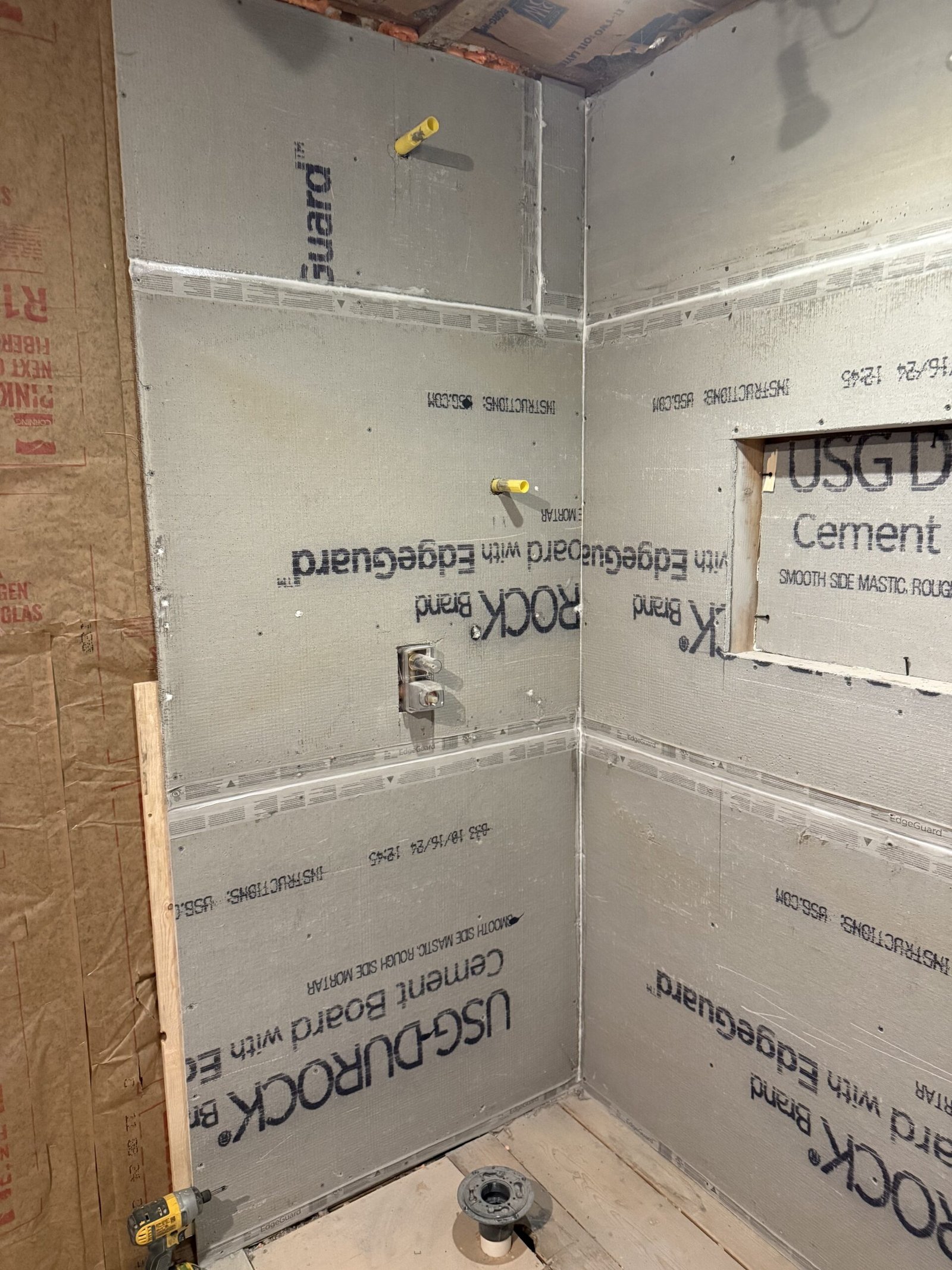 Shower walls prepared with a waterproofing system during bathroom renovation in Boxford Massachusetts
