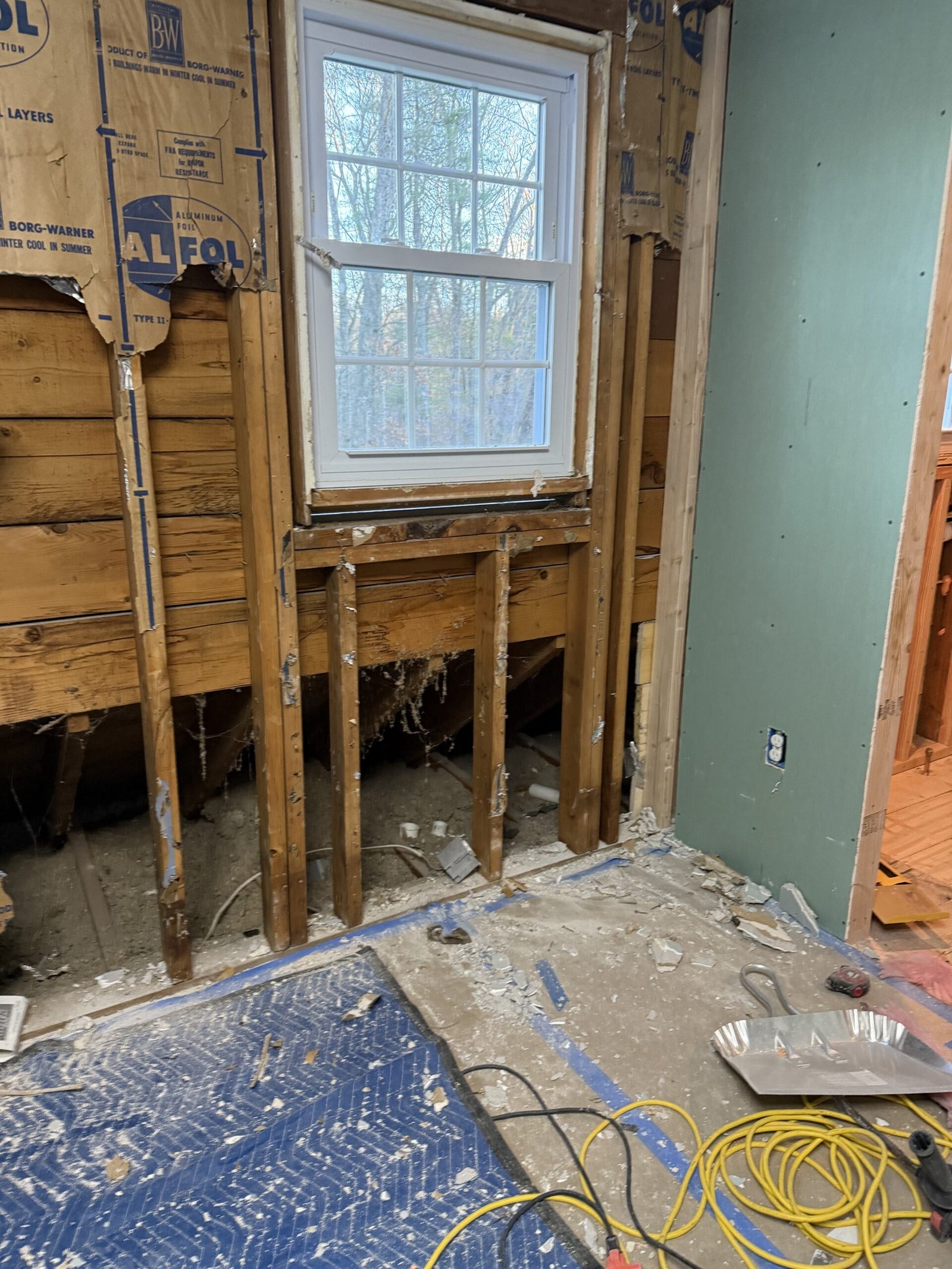 Open framing during wall relocation for a room expansion in Boxford Massachusetts