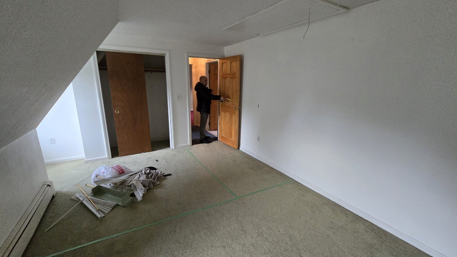 Original carpeted upstairs room before reconfiguration in Bridgewater Massachusetts