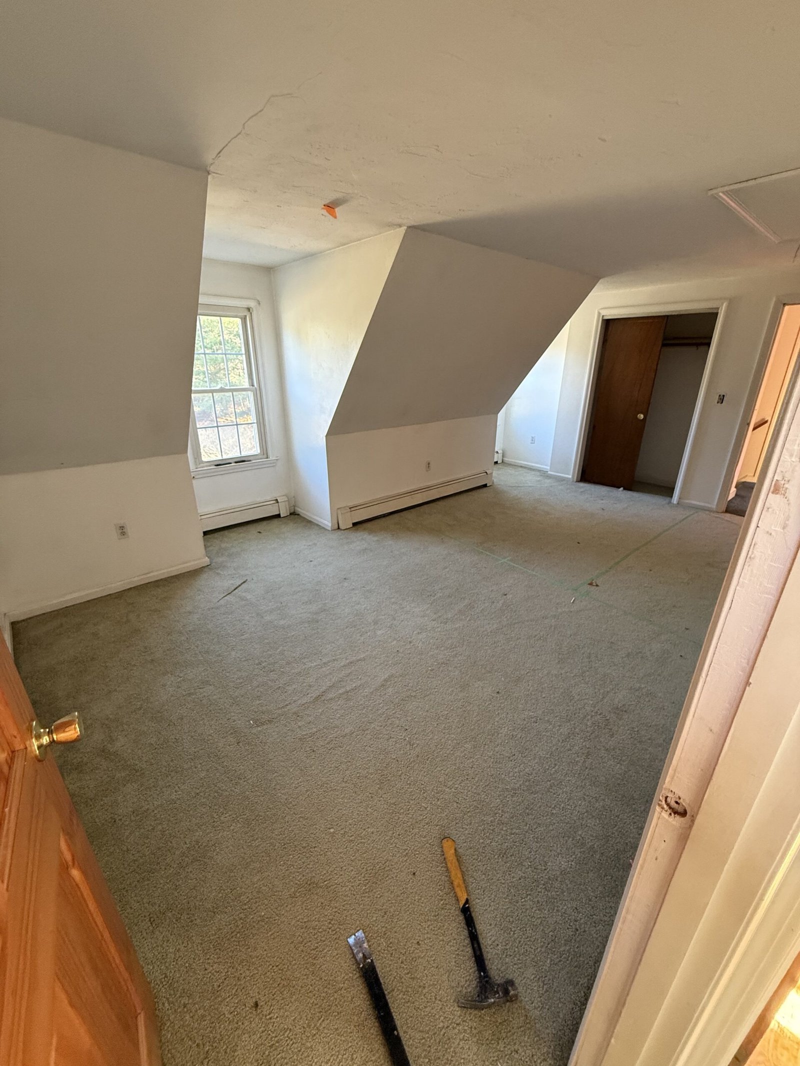 Second view of the original upstairs room with carpet before it was divided in Bridgewater Massachusetts