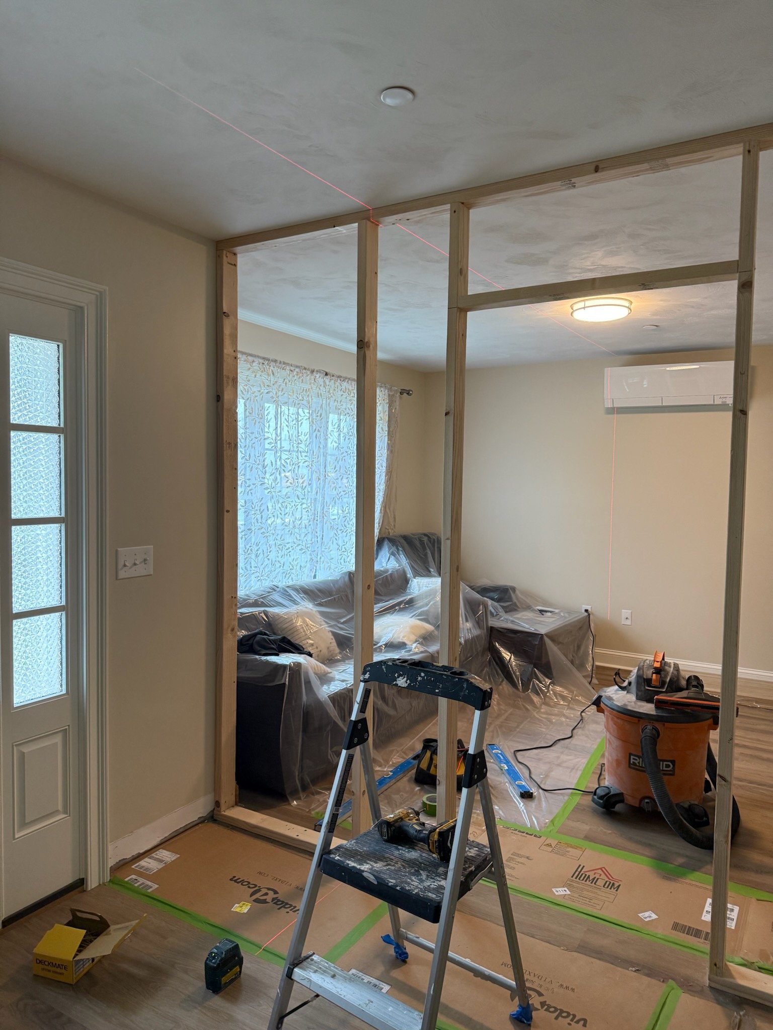 New hallway and partition framing during an upstairs room conversion in Bridgewater Massachusetts