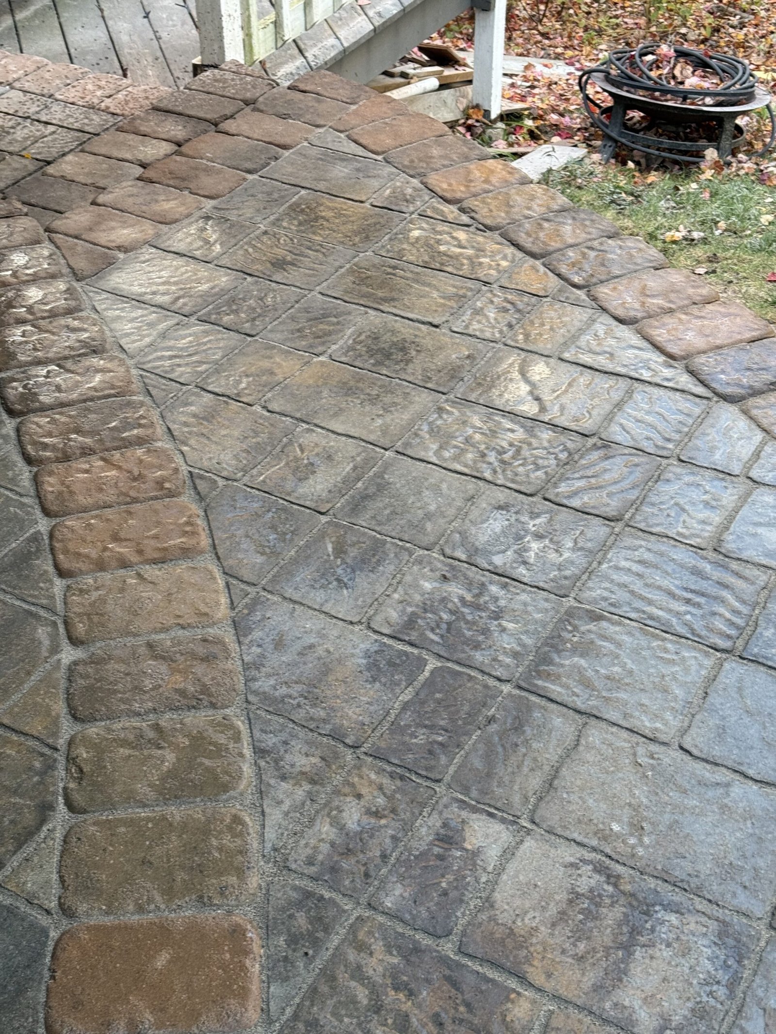 Finished curved paver walkway and patio border in Dover Massachusetts