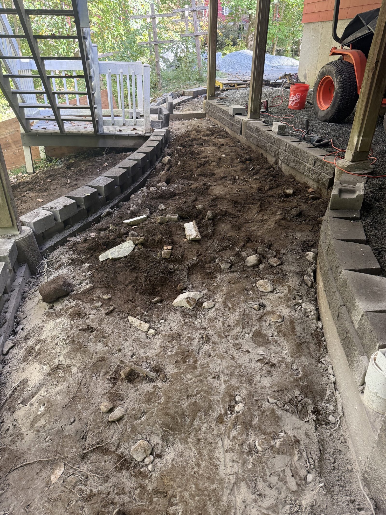 Rough graded site and early edge formation for a Dover patio project