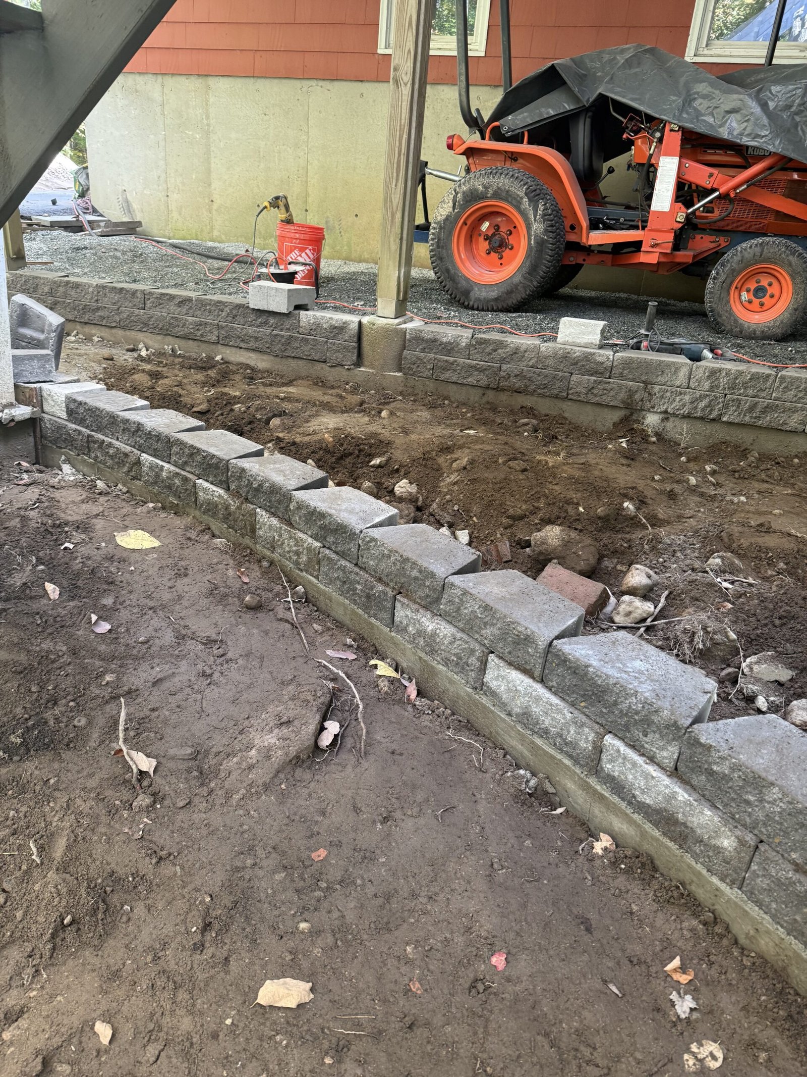 Retaining border and edge work taking shape around the Dover patio project