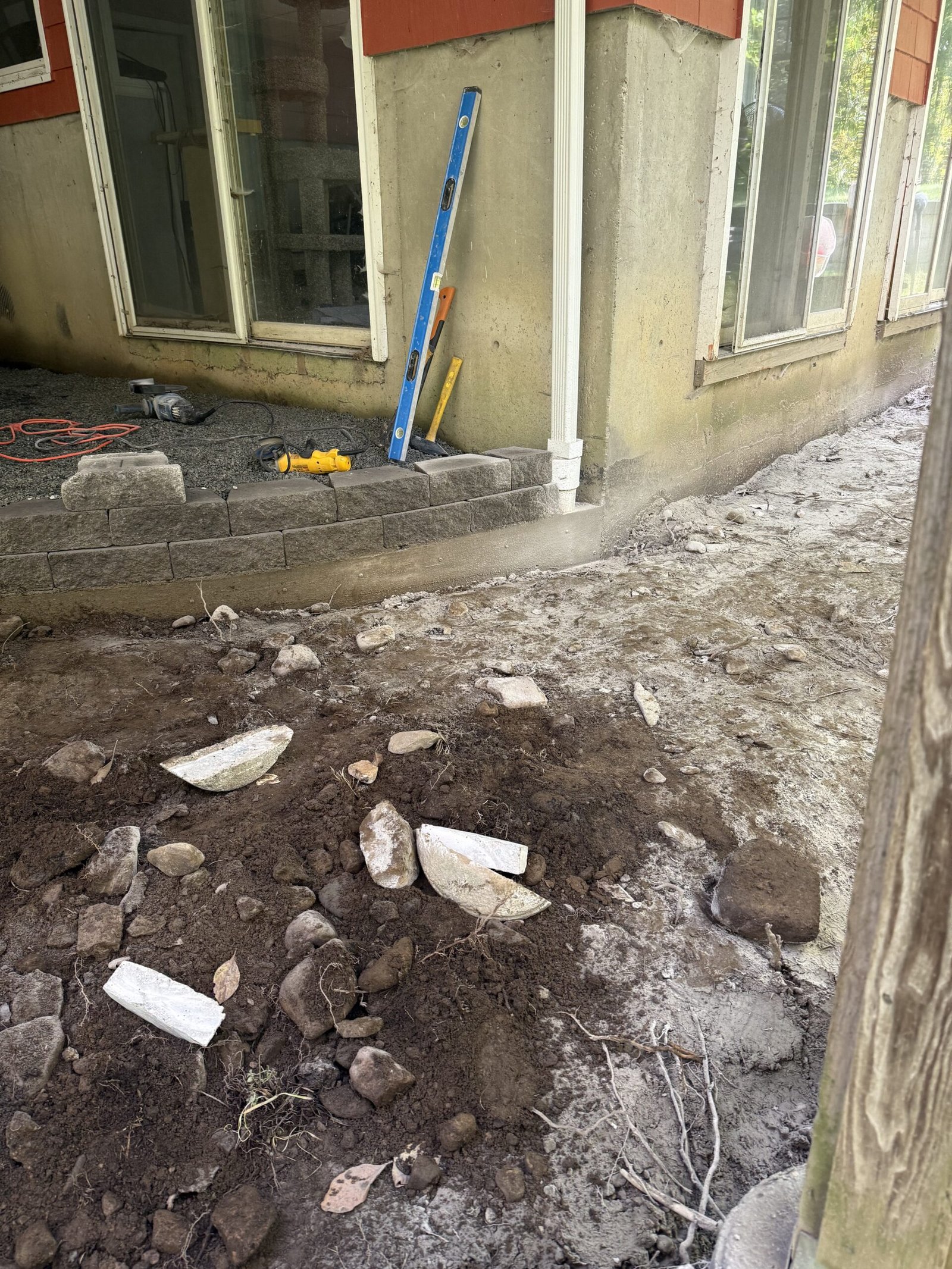 Patio perimeter opened and prepared for base work in Dover Massachusetts