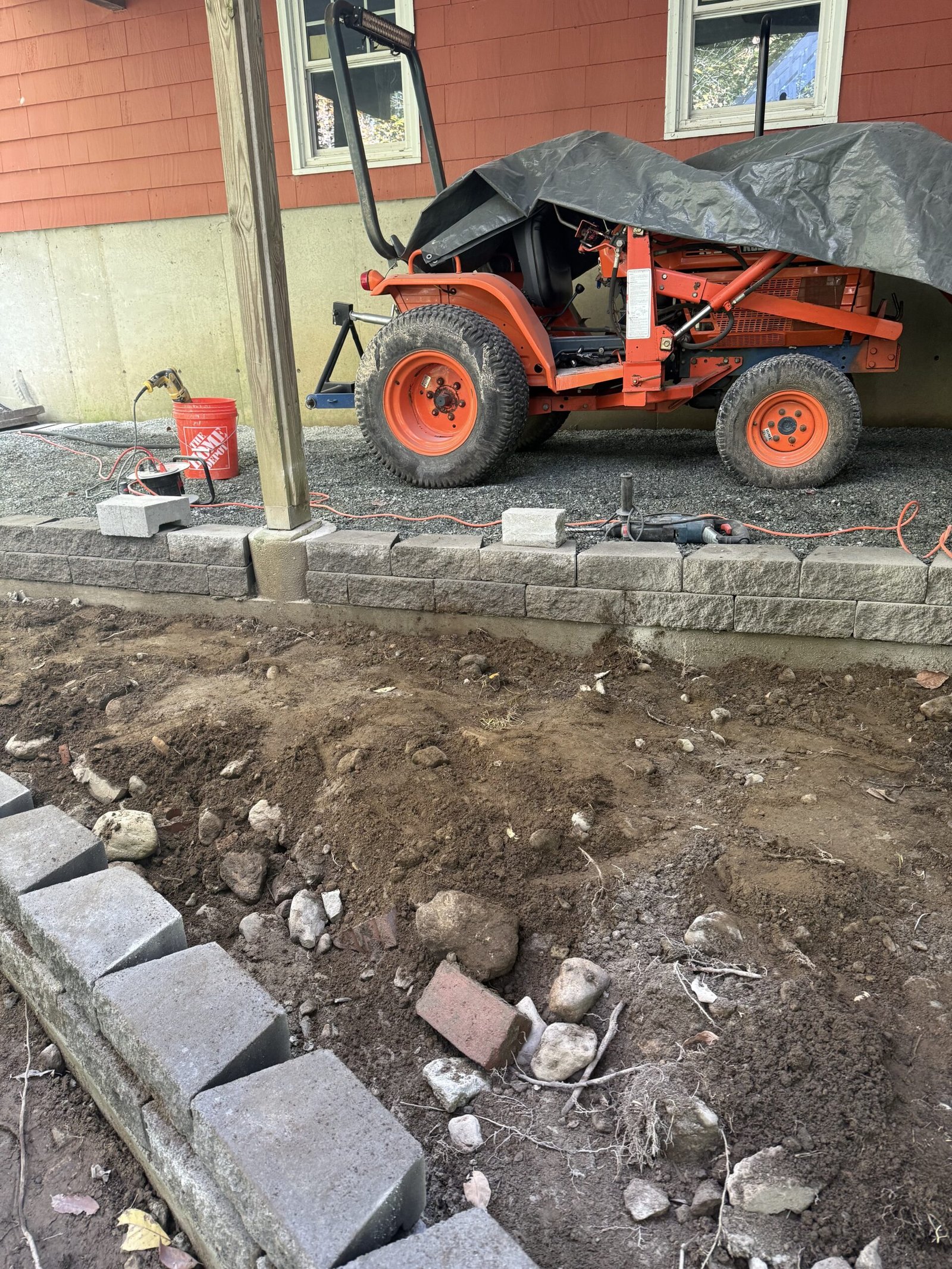 Outdoor patio footprint being shaped and graded in Dover Massachusetts