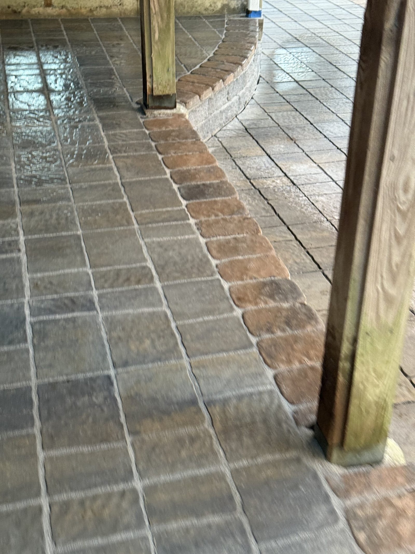 Finished patio and border detail beside the support post in Dover Massachusetts