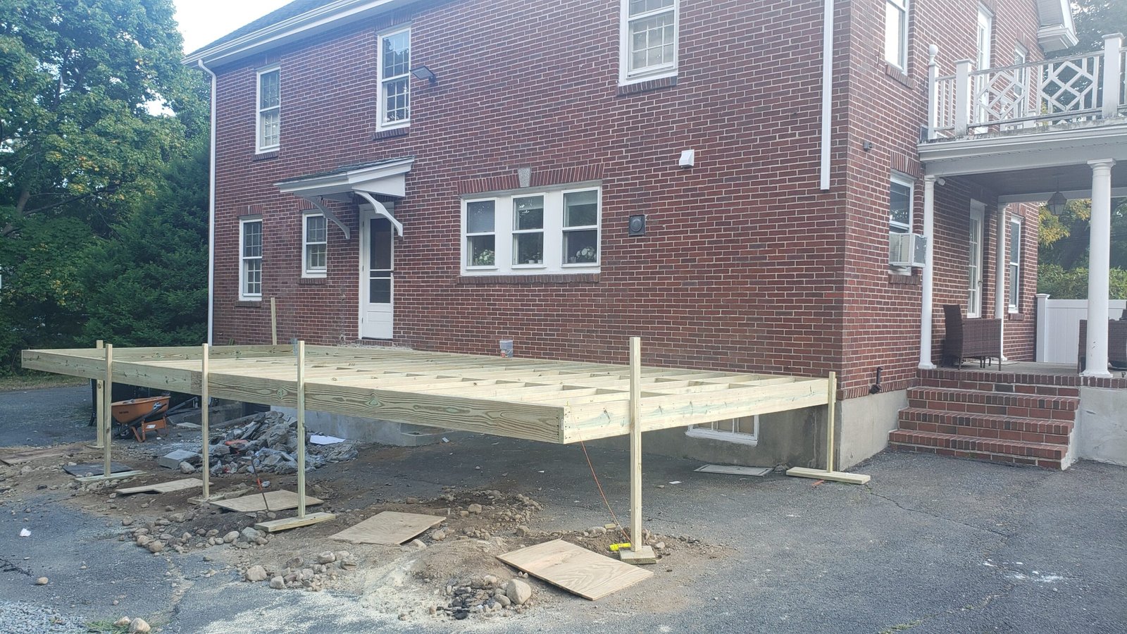 Support posts beams and joists being constructed for a new Marblehead deck