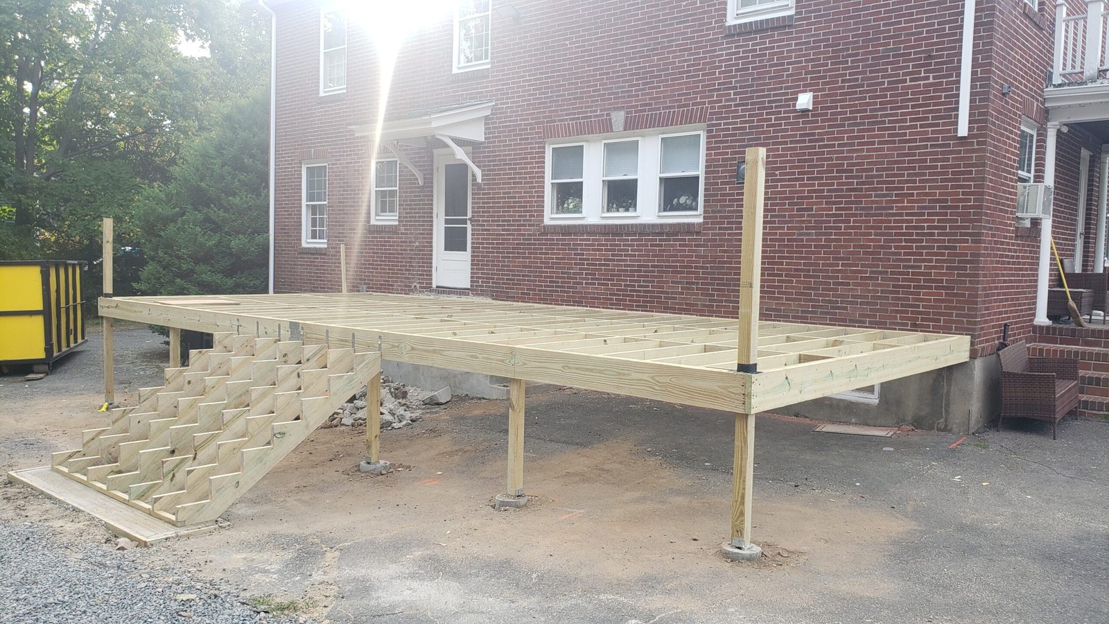 Structural deck frame and broad center stairs being built in Marblehead Massachusetts