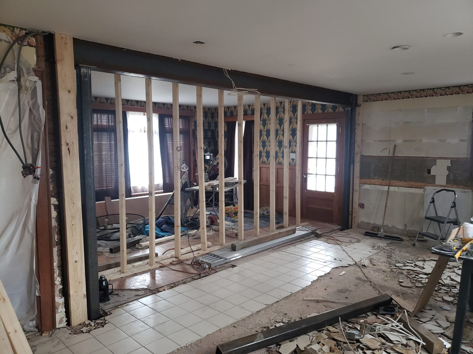 Expanded structural opening under construction during a Marblehead kitchen remodel