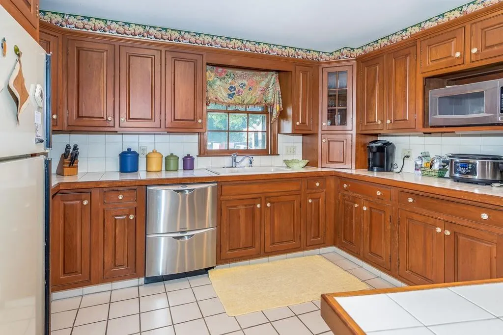 Original enclosed kitchen before remodeling in Marblehead Massachusetts