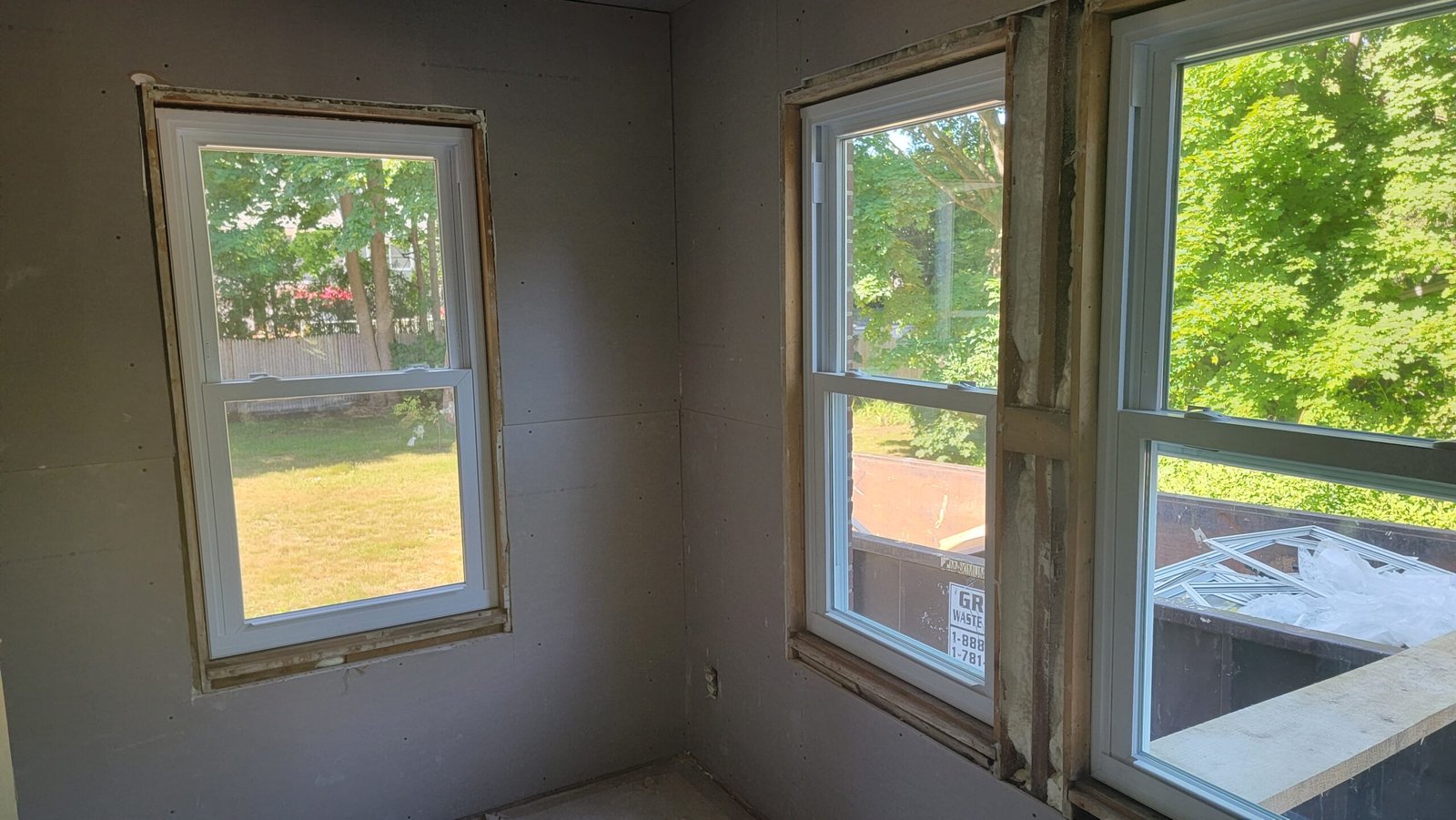 New drywall and windows installed during a Marblehead office reconstruction