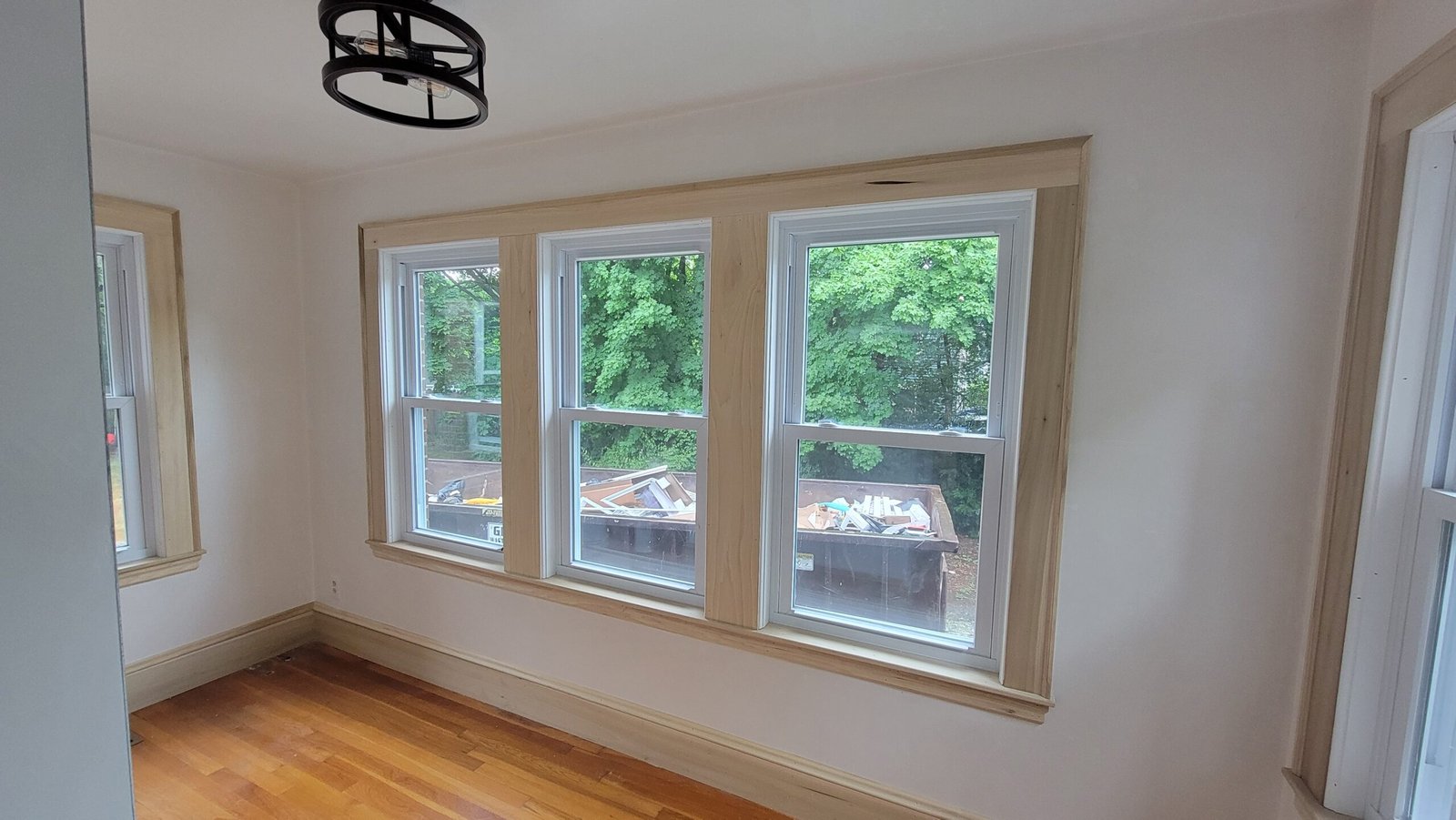 Completed Marblehead home office with new windows and restored hardwood flooring