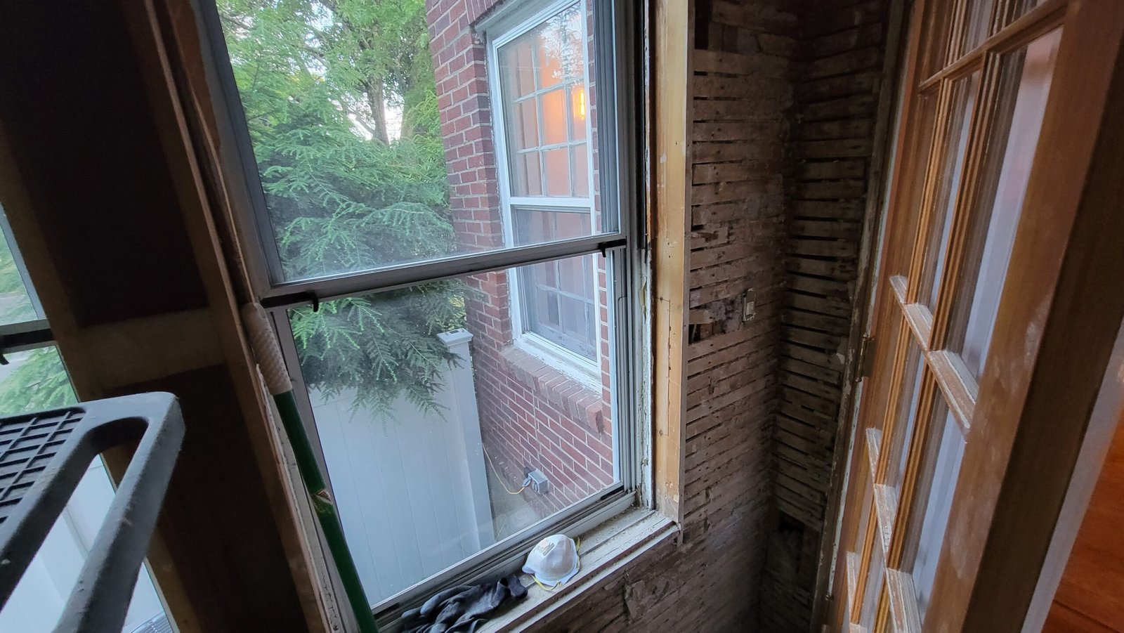 Window and surrounding wall cavity opened during a Marblehead office renovation