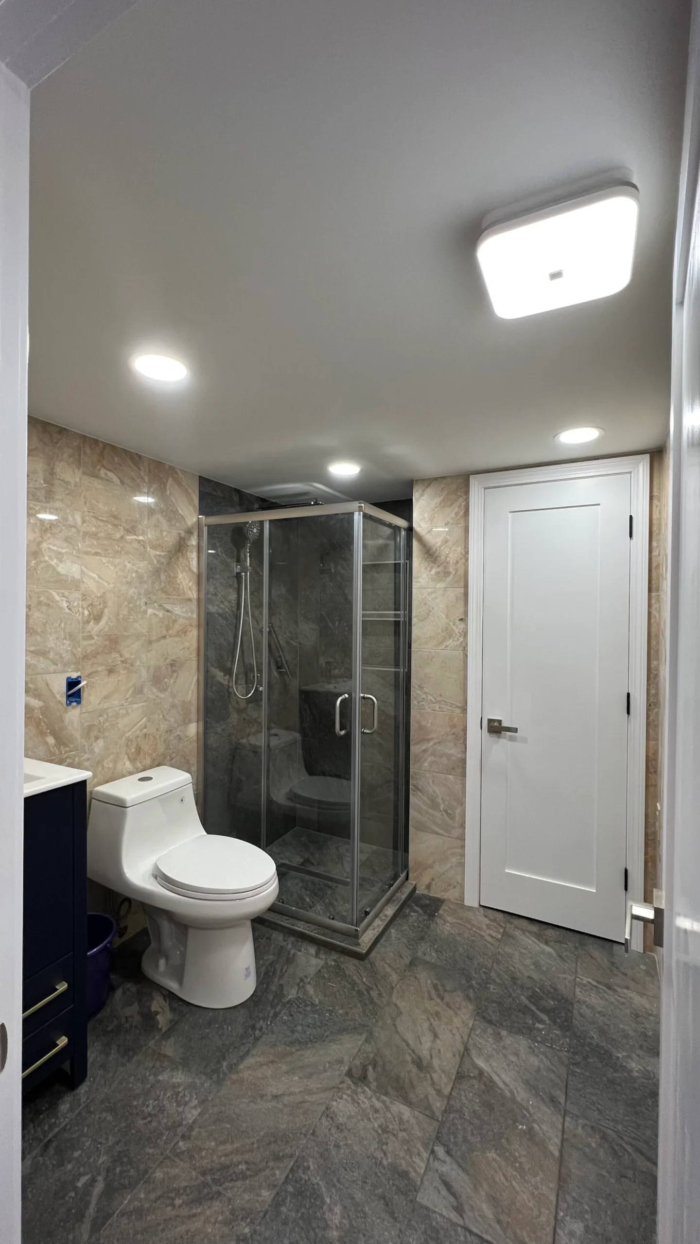 Completed tiled bathroom in a three-story Salem home renovation