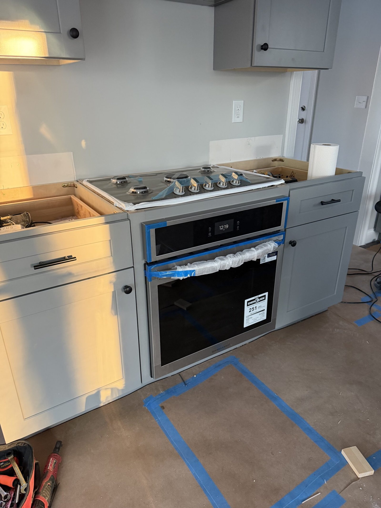 Finished custom built-in oven cooktop and cabinet in Uxbridge Massachusetts