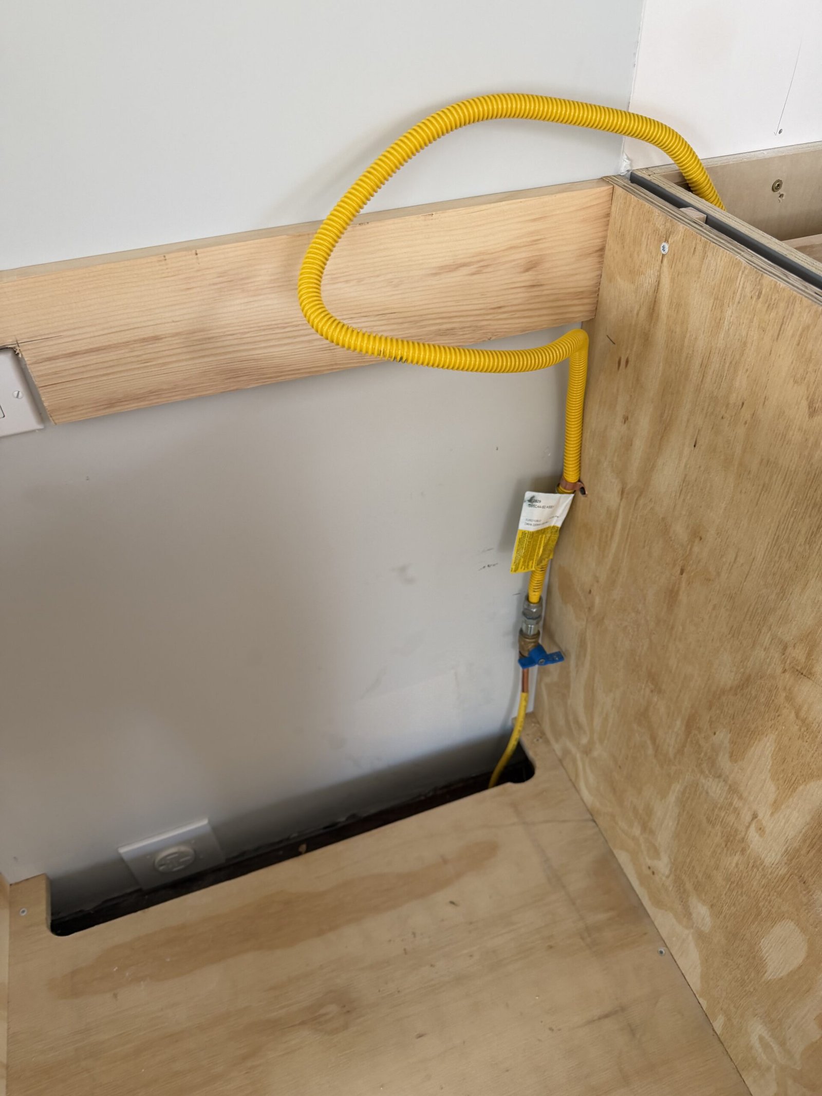 Electrical cable and cabinet cavity preparation for a built-in oven and cooktop in Uxbridge Massachusetts