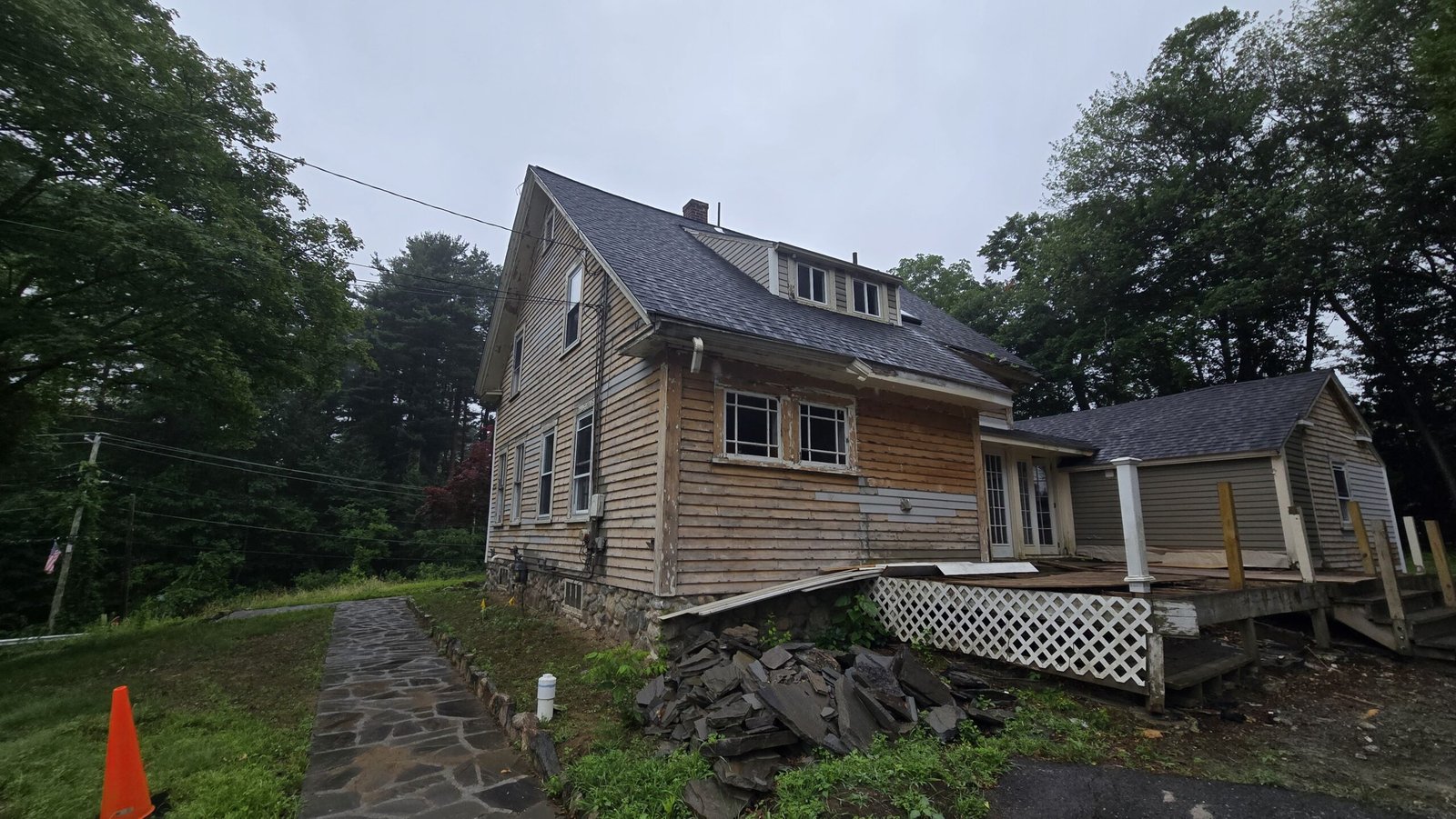 Exterior condition and cleared deck area when NERP took over in Wayland Massachusetts, photograph 1