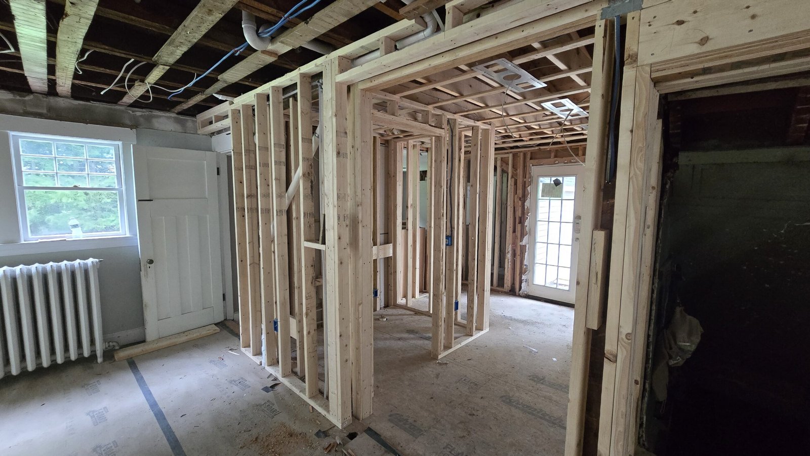Exposed framing and partially demolished room when NERP took over in Wayland Massachusetts, photograph 1