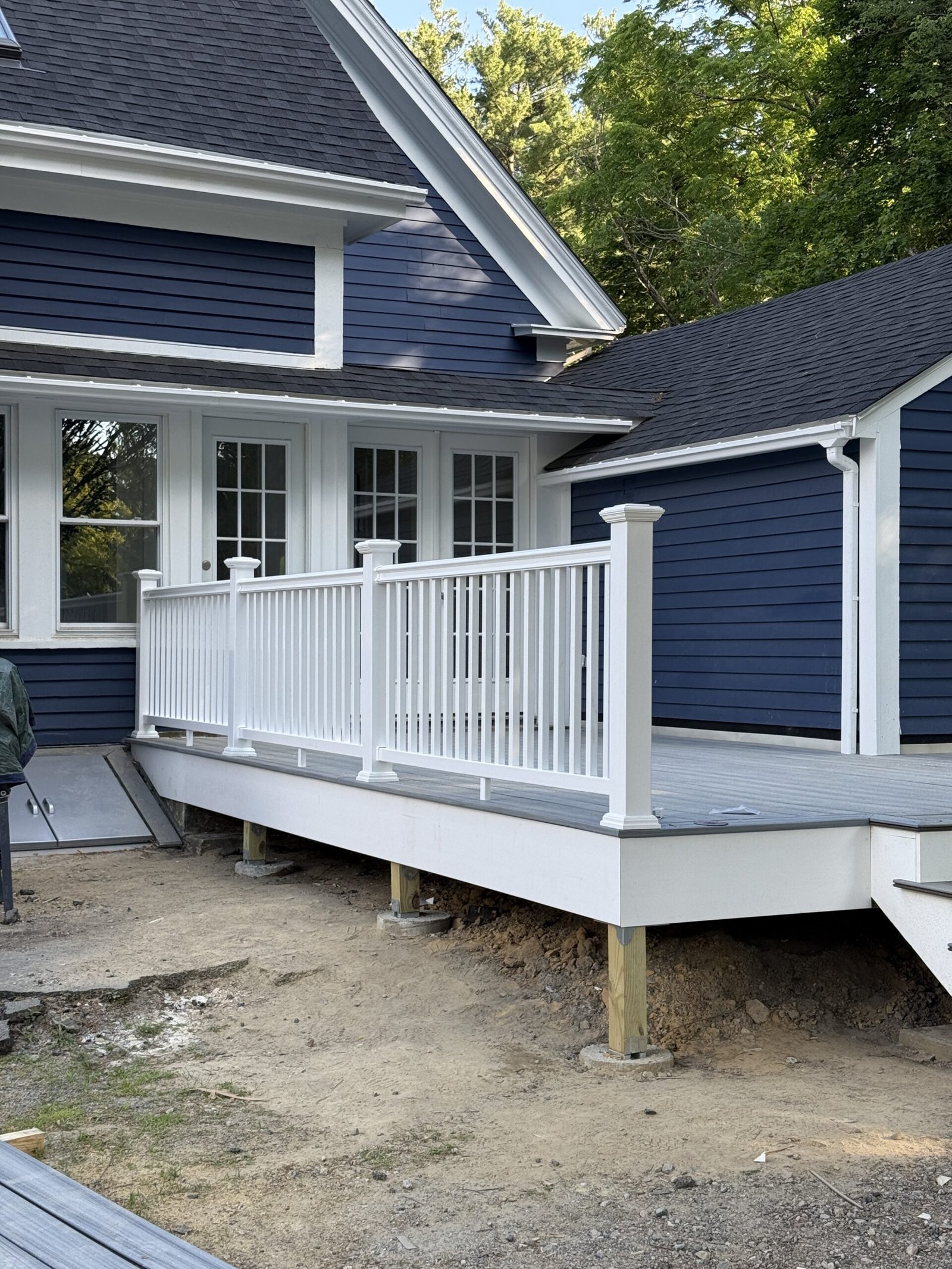 Railing installation during a deck construction project in Wayland Massachusetts, photograph 4