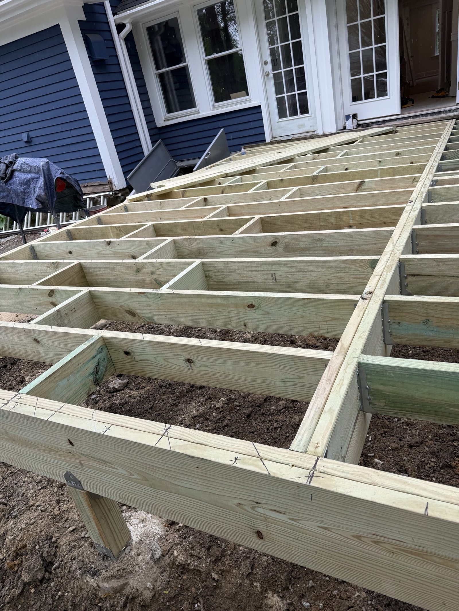 Wayland deck construction stage from site preparation through finished deck in Wayland Massachusetts, photograph 3