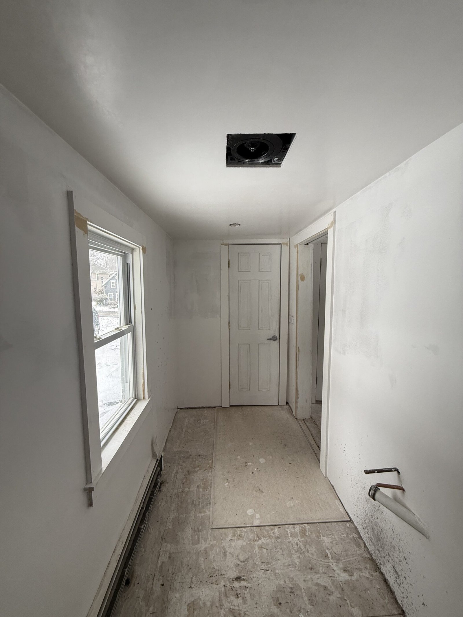 Open ceiling, wall repair, or drywall work during whole-house renovation in Wayland Massachusetts, photograph 8