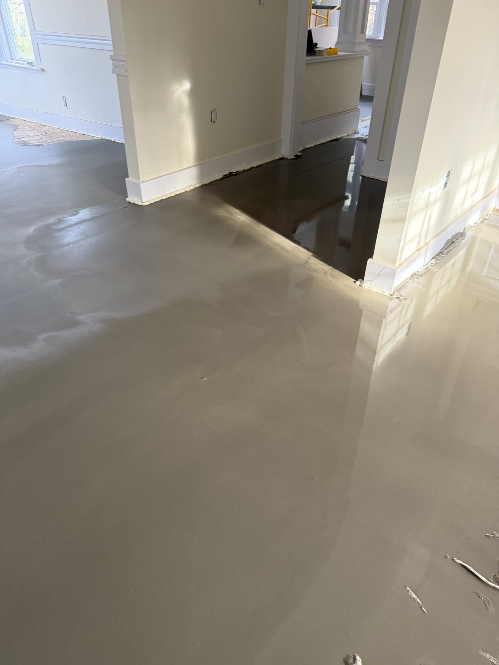 Self-leveling compound and final floor preparation during whole-house renovation in Wayland Massachusetts, photograph 5