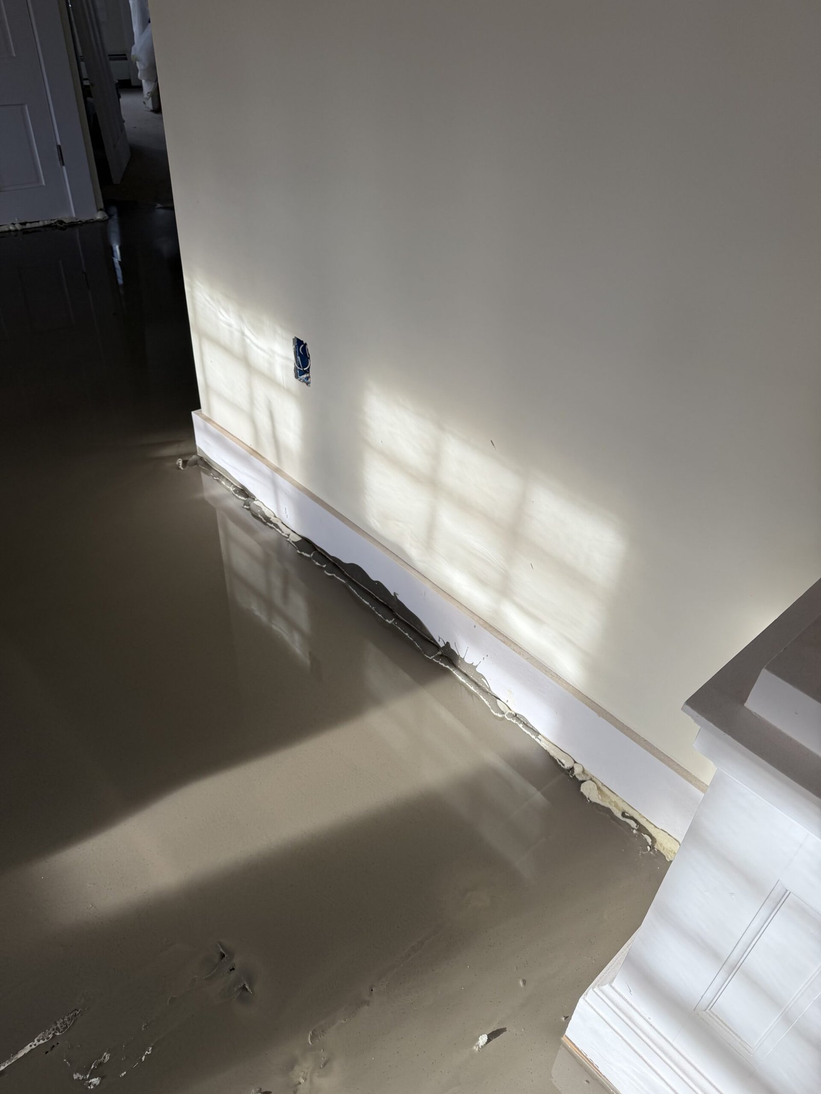 Self-leveling compound and final floor preparation during whole-house renovation in Wayland Massachusetts, photograph 6