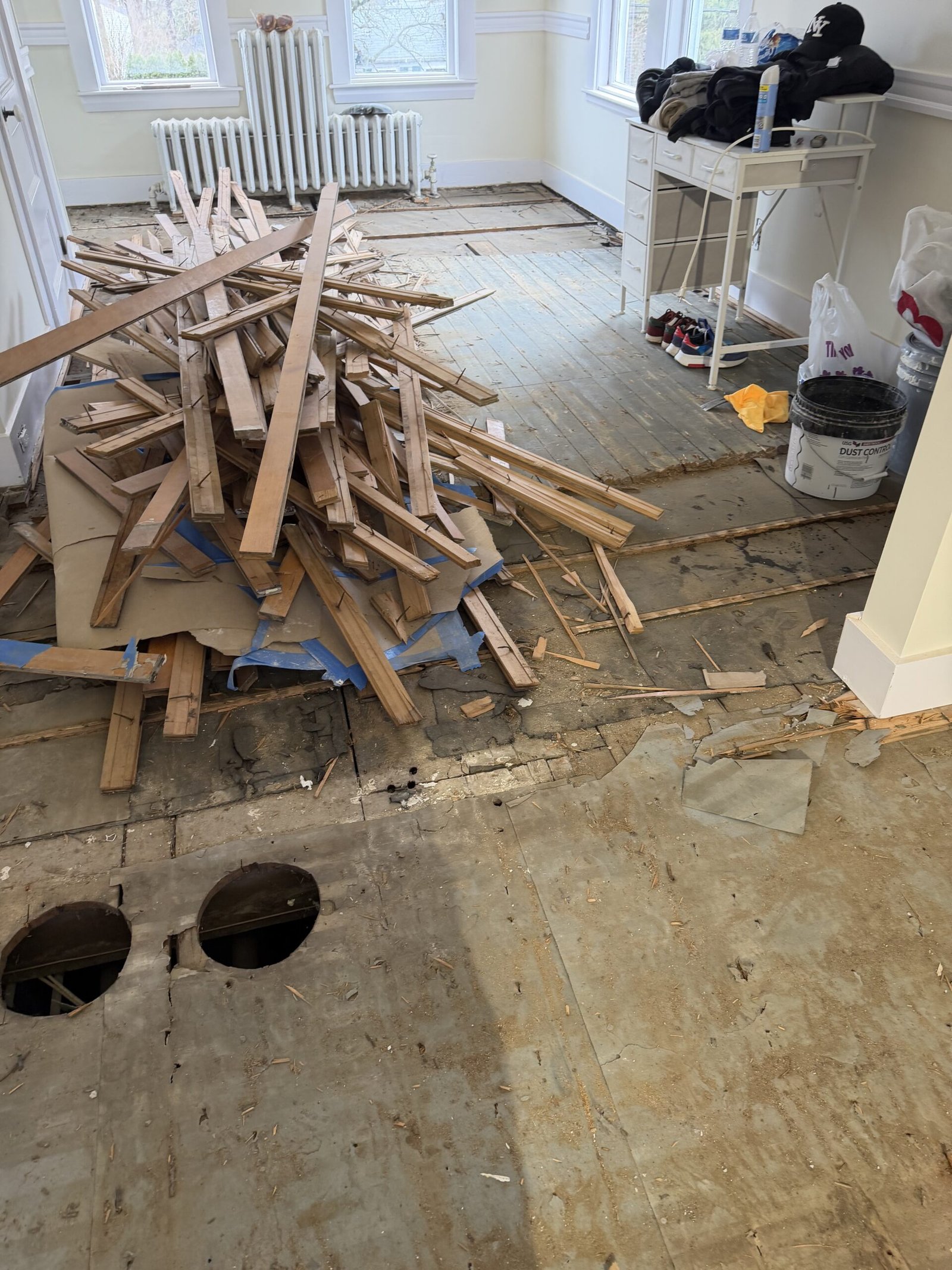 Old flooring removal and substrate preparation during whole-house renovation in Wayland Massachusetts, photograph 4