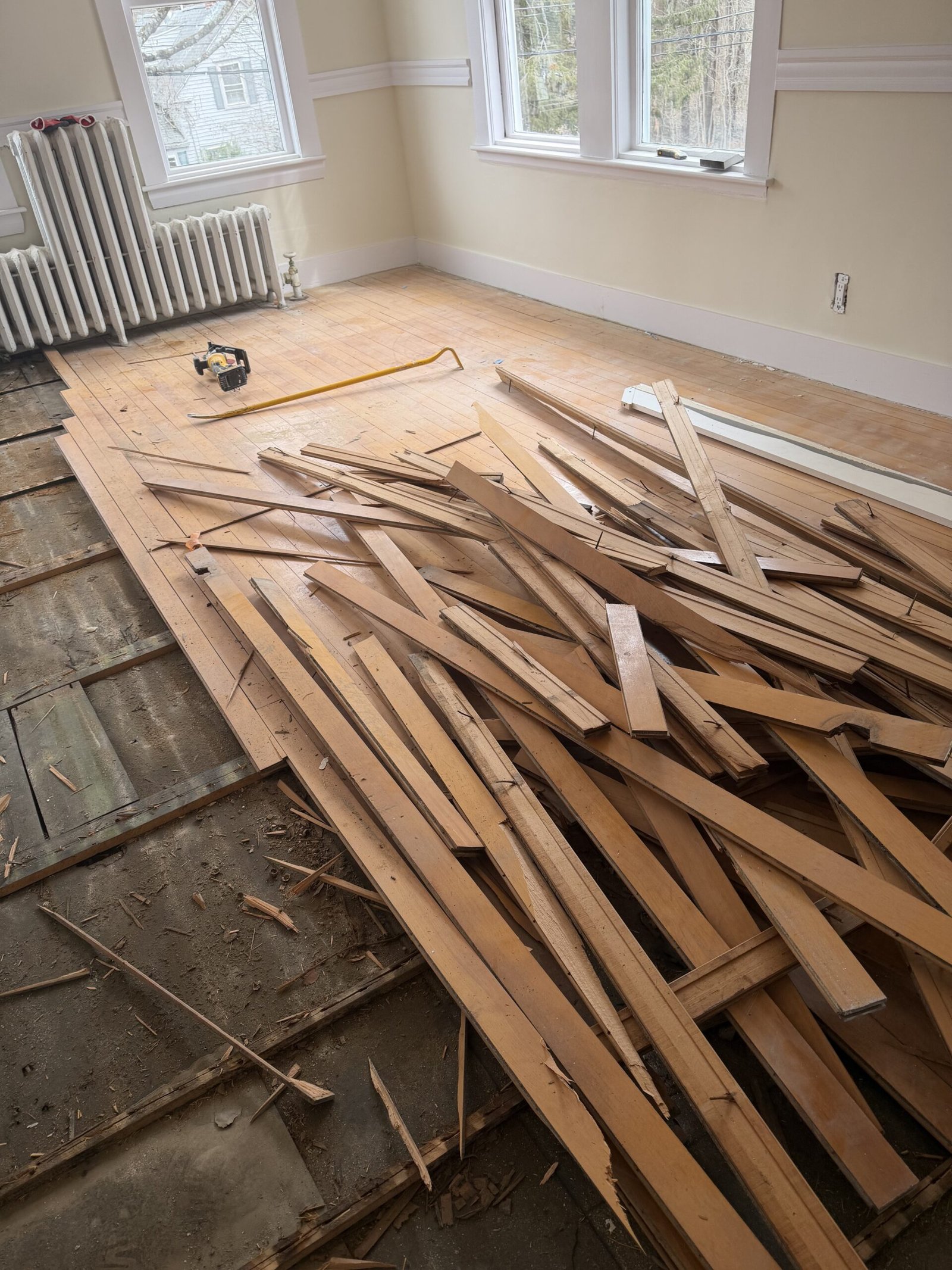 Old flooring removal and substrate preparation during whole-house renovation in Wayland Massachusetts, photograph 5