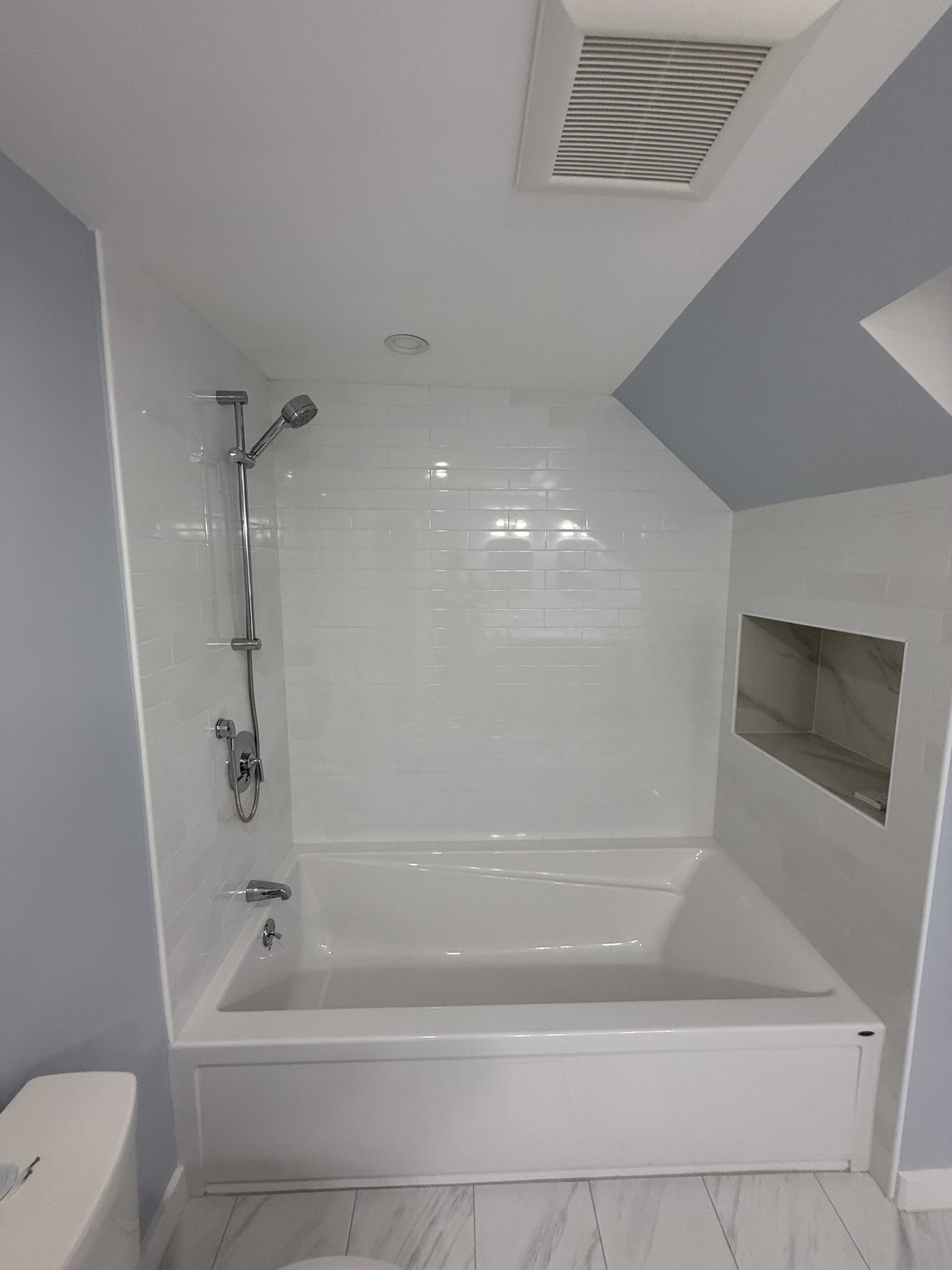 Contractor-taken completed bathroom after whole-house renovation in Wayland Massachusetts, photograph 1
