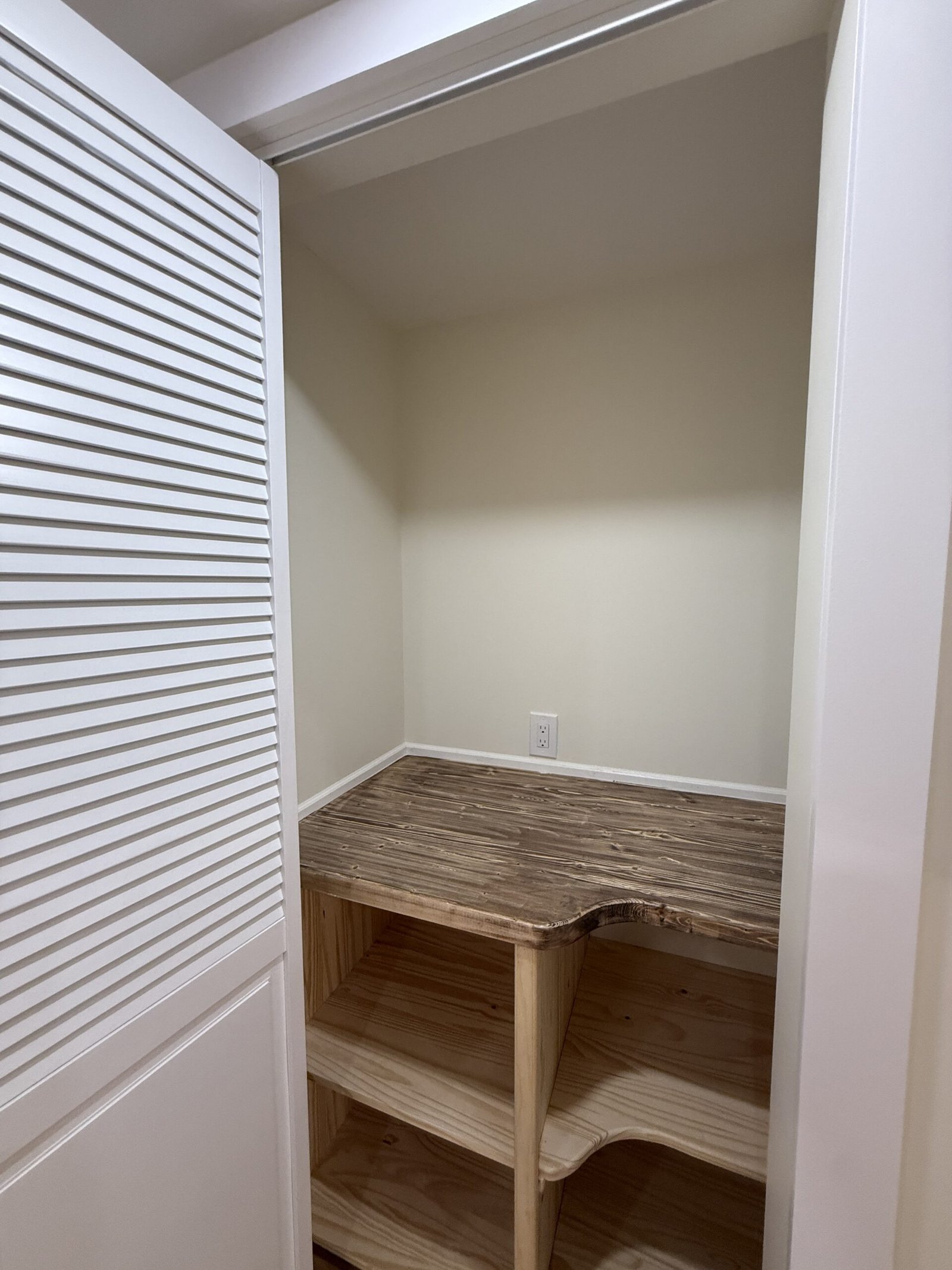 Contractor-taken completed bedroom, closet, or storage area after renovation in Wayland Massachusetts, photograph 6