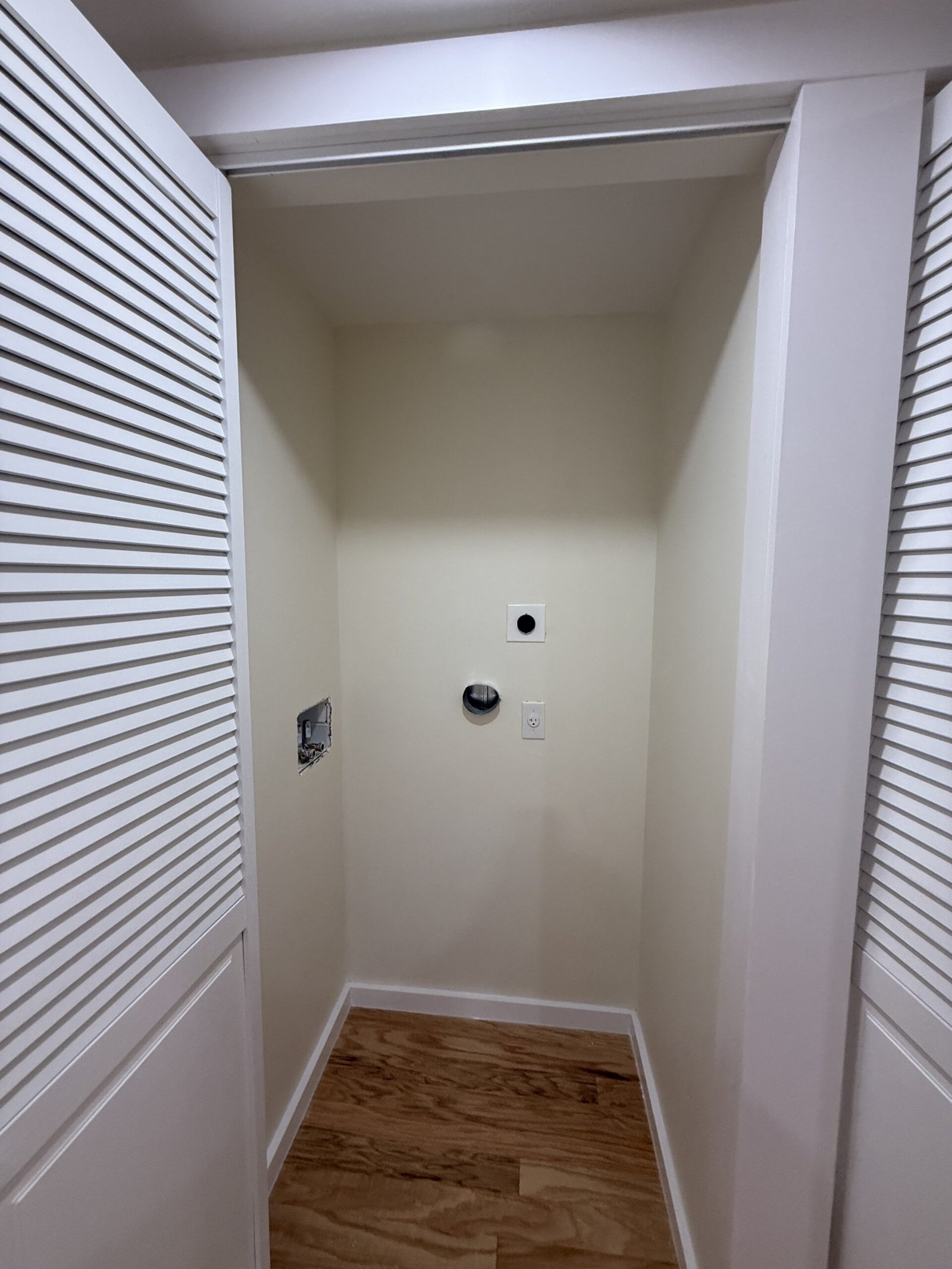 Contractor-taken completed bedroom, closet, or storage area after renovation in Wayland Massachusetts, photograph 8
