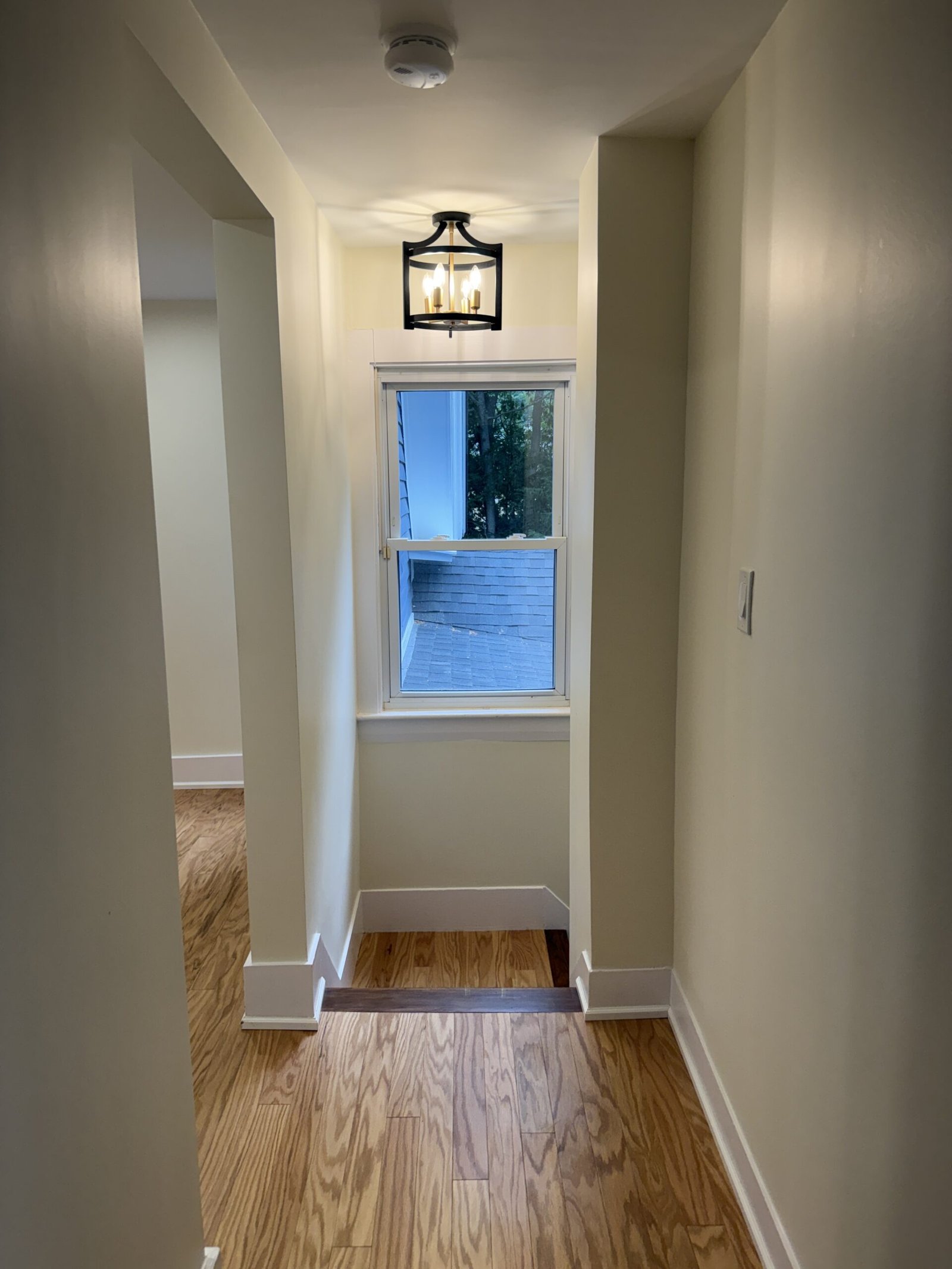 Completed hallway or refinished stair area after whole-house renovation in Wayland Massachusetts, photograph 2