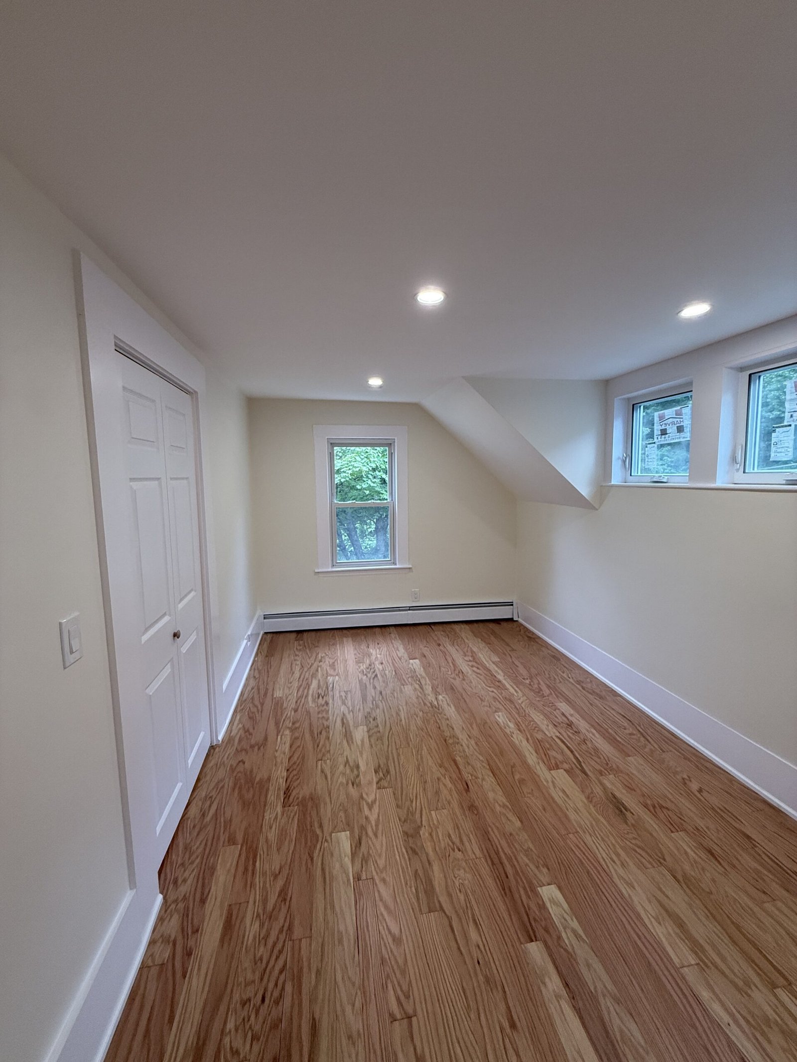 Contractor-taken completed bedroom, closet, or storage area after renovation in Wayland Massachusetts, photograph 12