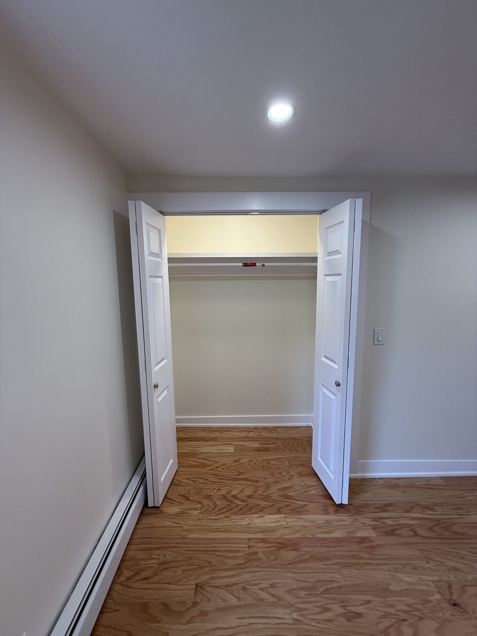 Contractor-taken completed bedroom, closet, or storage area after renovation in Wayland Massachusetts, photograph 15