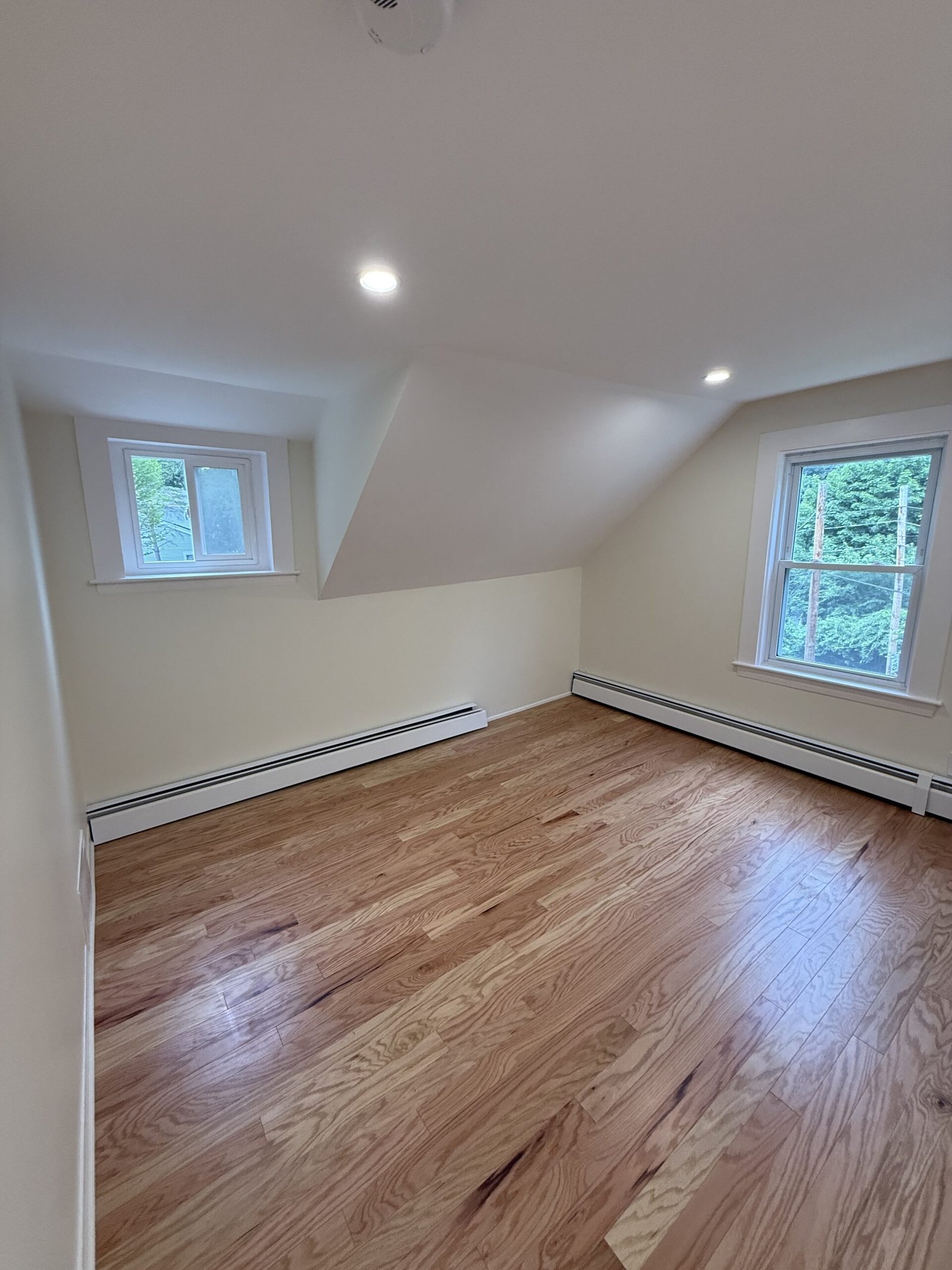 Contractor-taken completed bedroom, closet, or storage area after renovation in Wayland Massachusetts, photograph 16