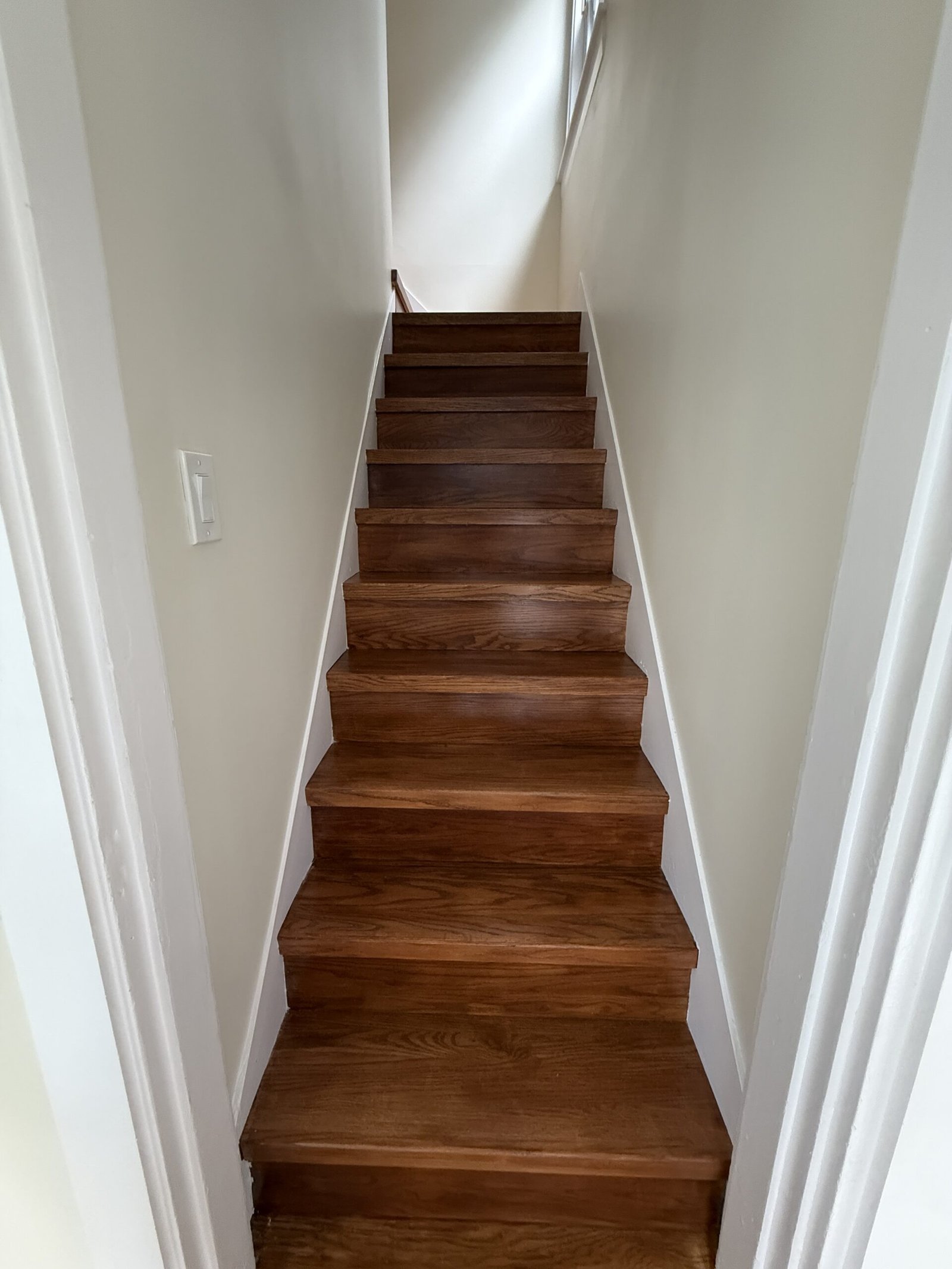 Completed hallway or refinished stair area after whole-house renovation in Wayland Massachusetts, photograph 4
