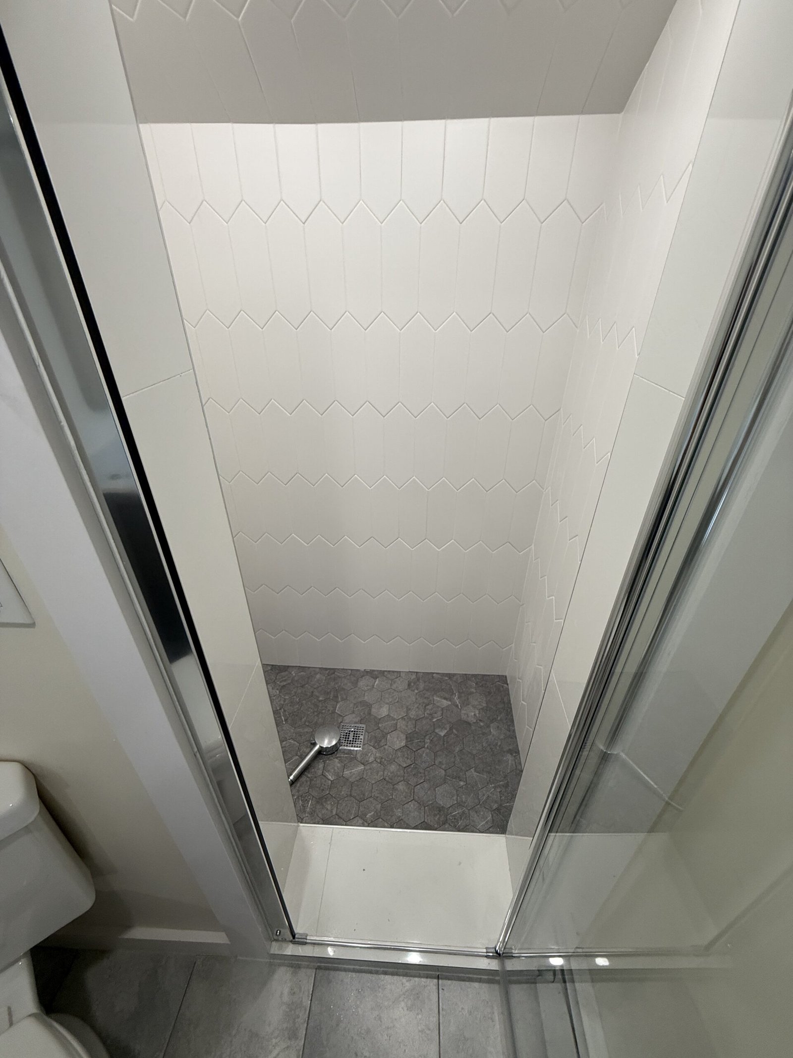 Contractor-taken completed bathroom after whole-house renovation in Wayland Massachusetts, photograph 5