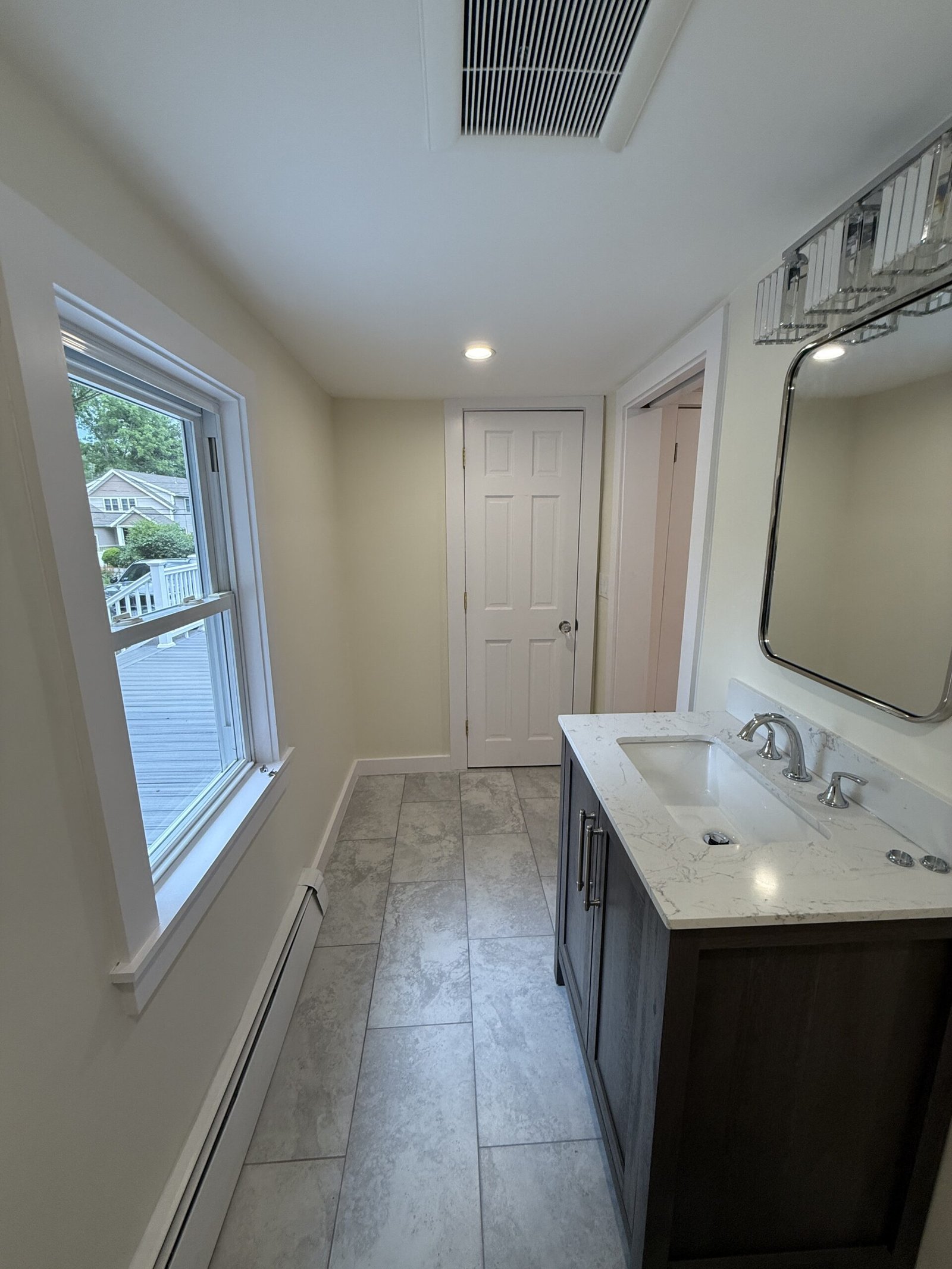 Contractor-taken completed bathroom after whole-house renovation in Wayland Massachusetts, photograph 6