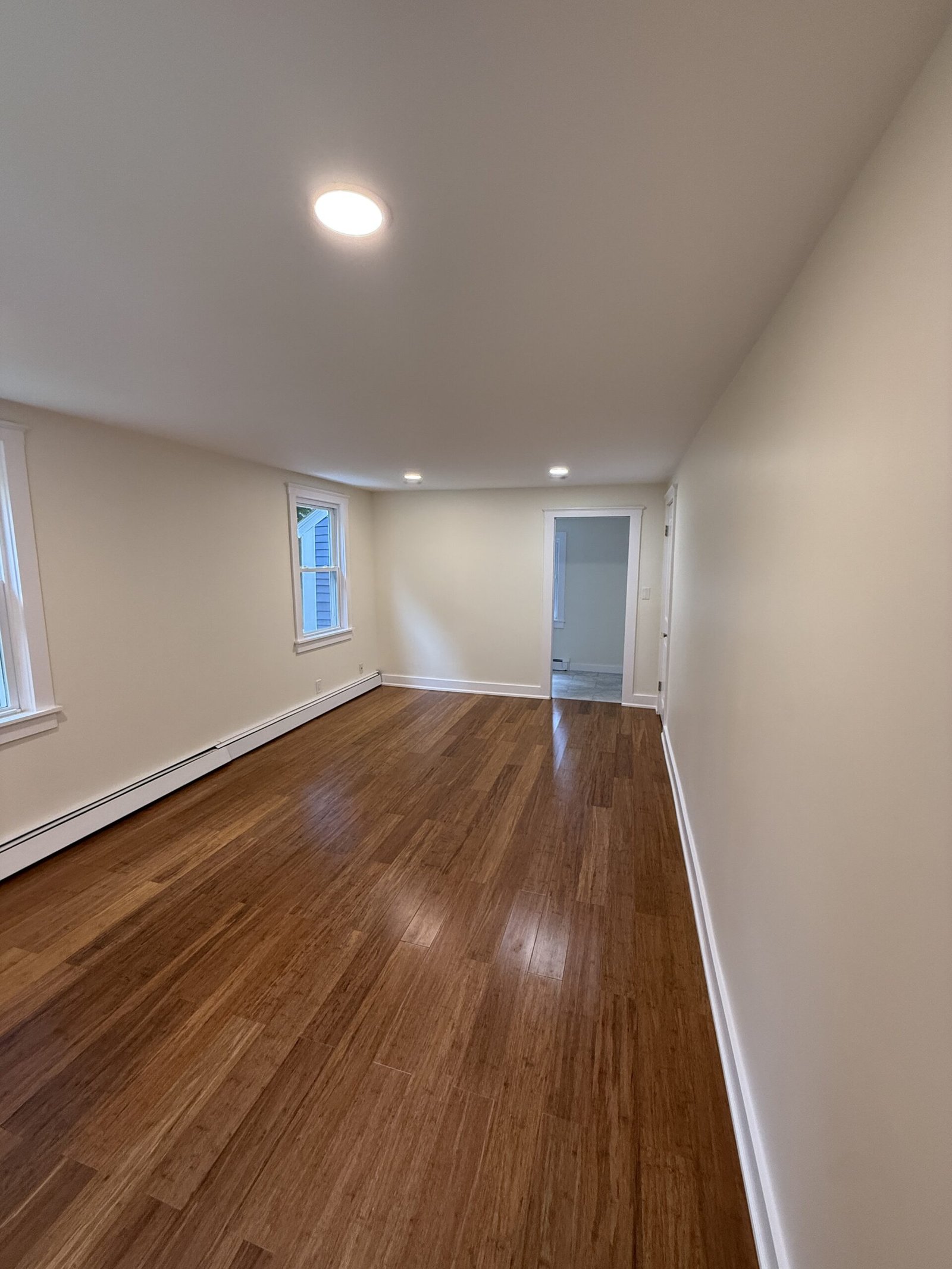 Contractor-taken completed kitchen, built-in, or connected living space after renovation in Wayland Massachusetts, photograph 4