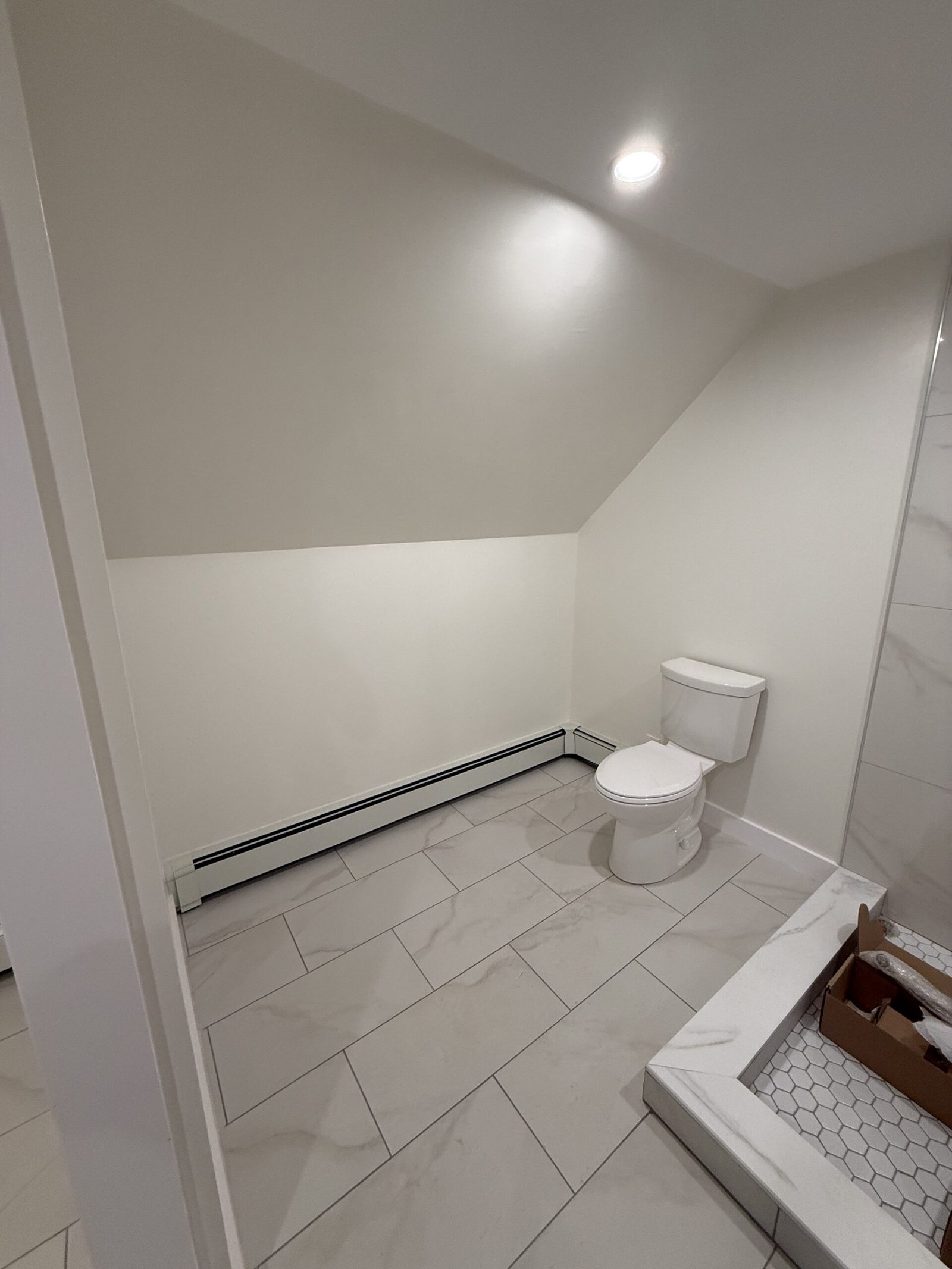 Contractor-taken completed bathroom after whole-house renovation in Wayland Massachusetts, photograph 8