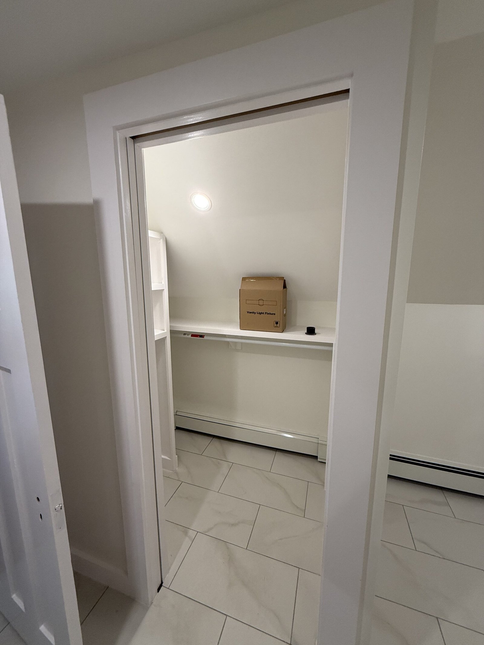 Contractor-taken completed bathroom after whole-house renovation in Wayland Massachusetts, photograph 9
