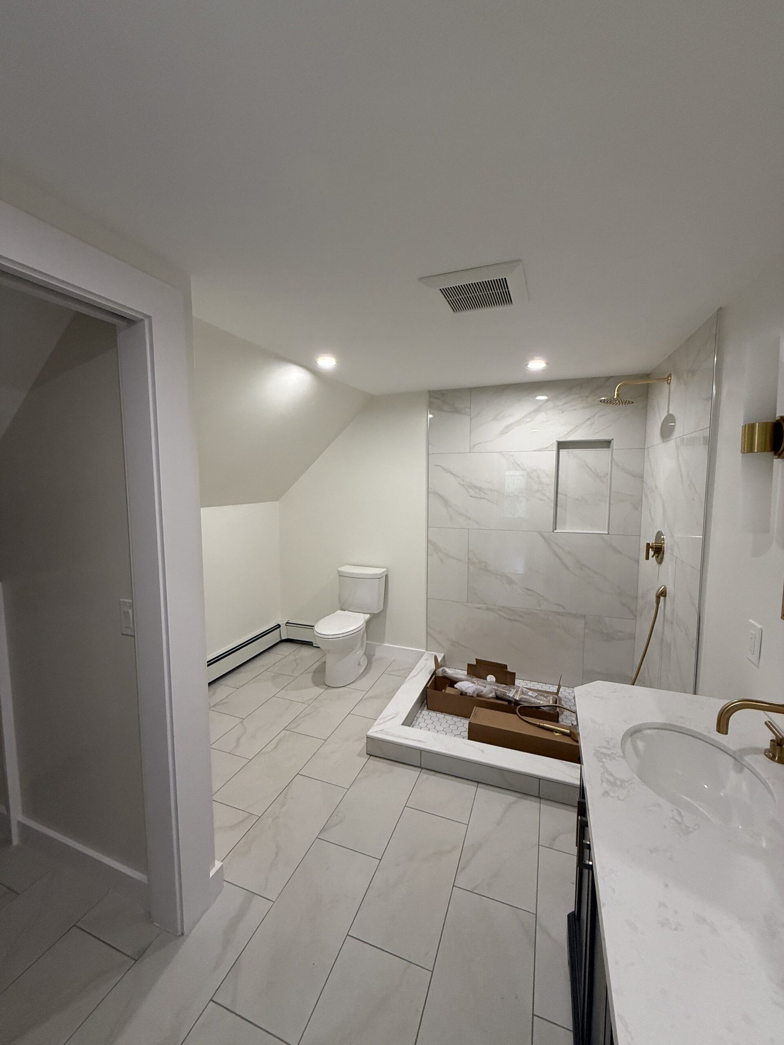 Contractor-taken completed bathroom after whole-house renovation in Wayland Massachusetts, photograph 10