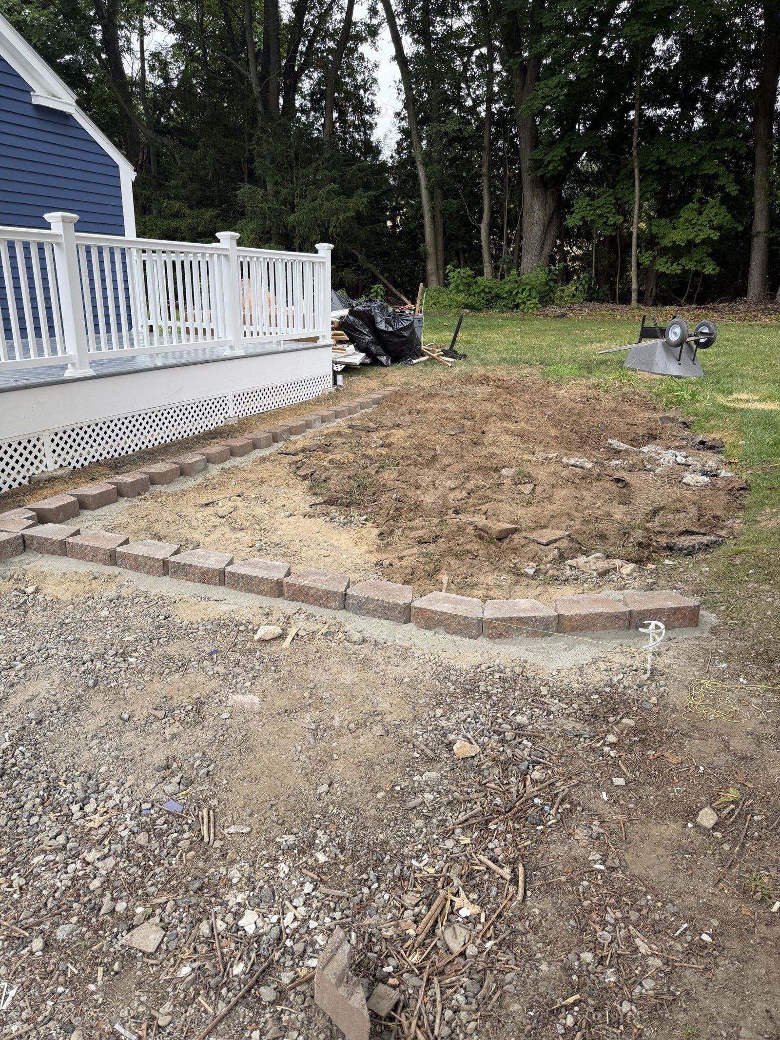 Front paver patio construction in progress in Wayland Massachusetts, photograph 1