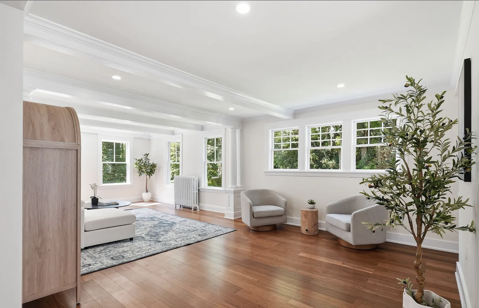 Professionally staged living and dining space after whole-house renovation in Wayland Massachusetts — view 2