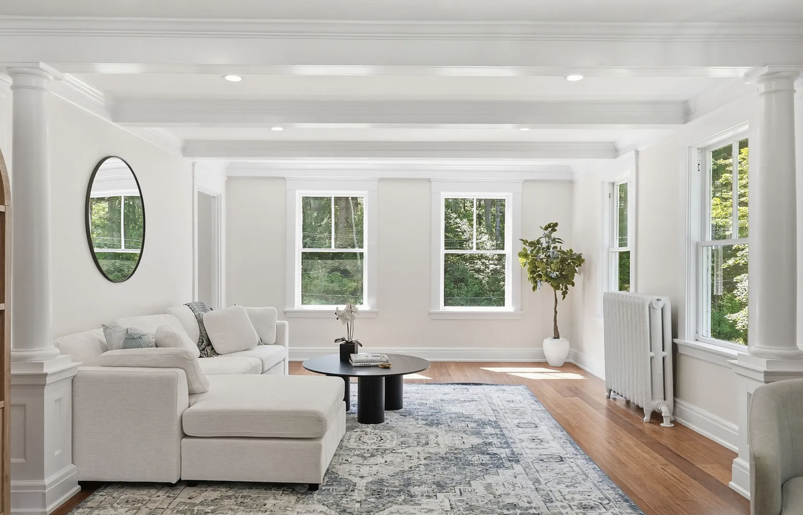 Professionally staged living and dining space after whole-house renovation in Wayland Massachusetts — view 3