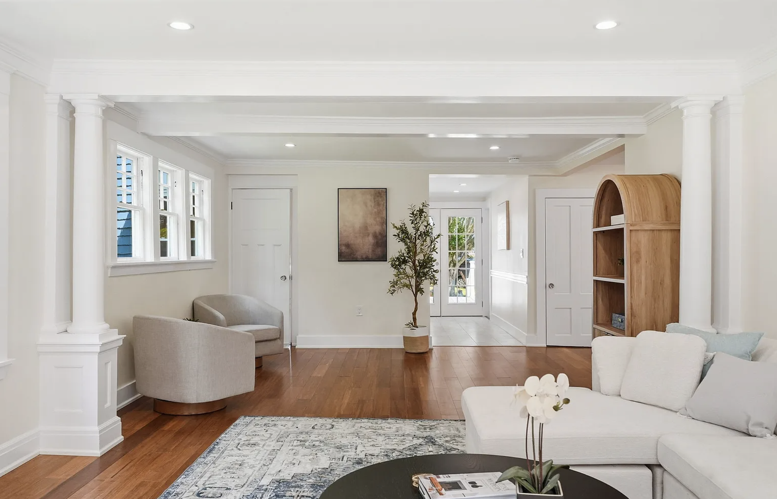 Professionally staged living and dining space after whole-house renovation in Wayland Massachusetts — view 4