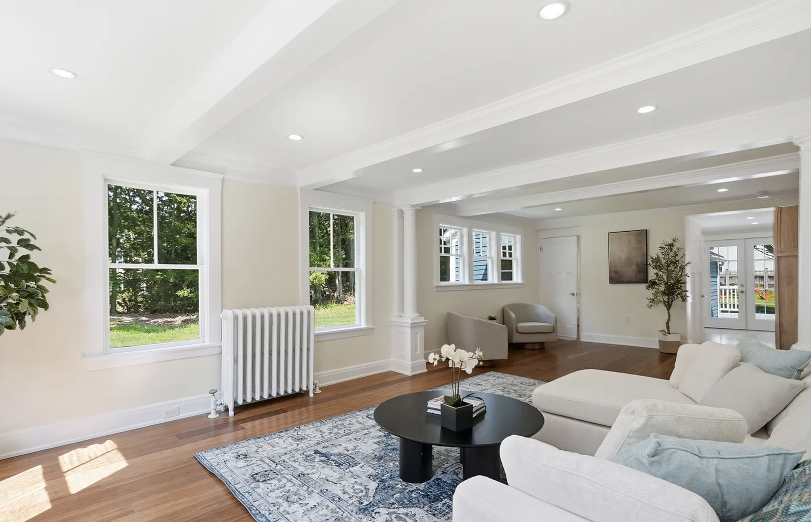 Professionally staged living and dining space after whole-house renovation in Wayland Massachusetts — view 5