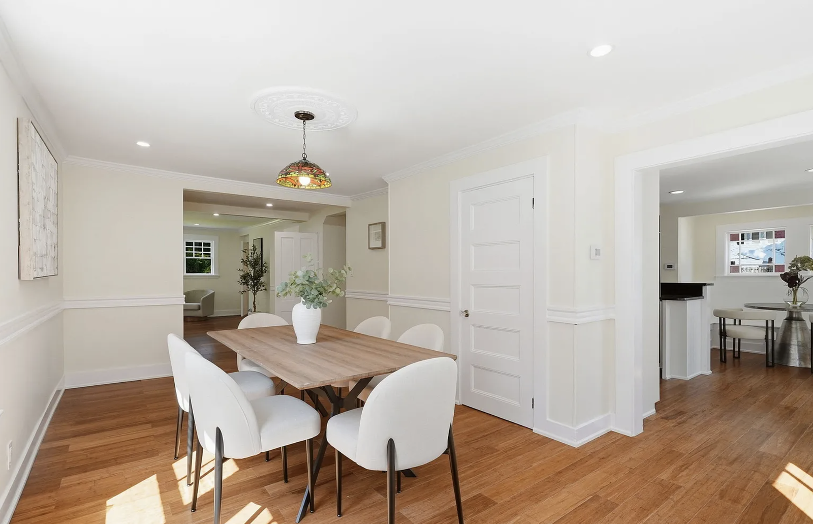 Professionally staged living and dining space after whole-house renovation in Wayland Massachusetts — view 6